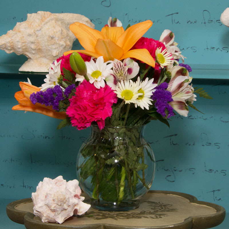Modern Romance - Tall vase filled with seasonal flowers