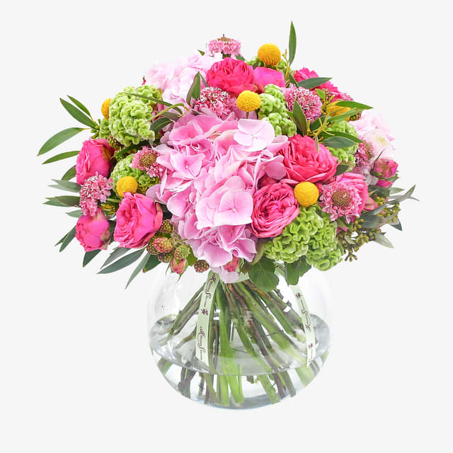 Artisans floral arrangement - Experience the beautiful textures of our Destined to Fly flower bouquet. Made by our skilled artisans, this floral arrangement blends sumptuous “Sweet Verena” hydrangeas with hot pink roses, celosia, ever beautiful Rubus berries, scabiosa and eucalyptus. It is a perfect gift for just about any occasion and is destined to delight the senses and leave a lasting impression.
