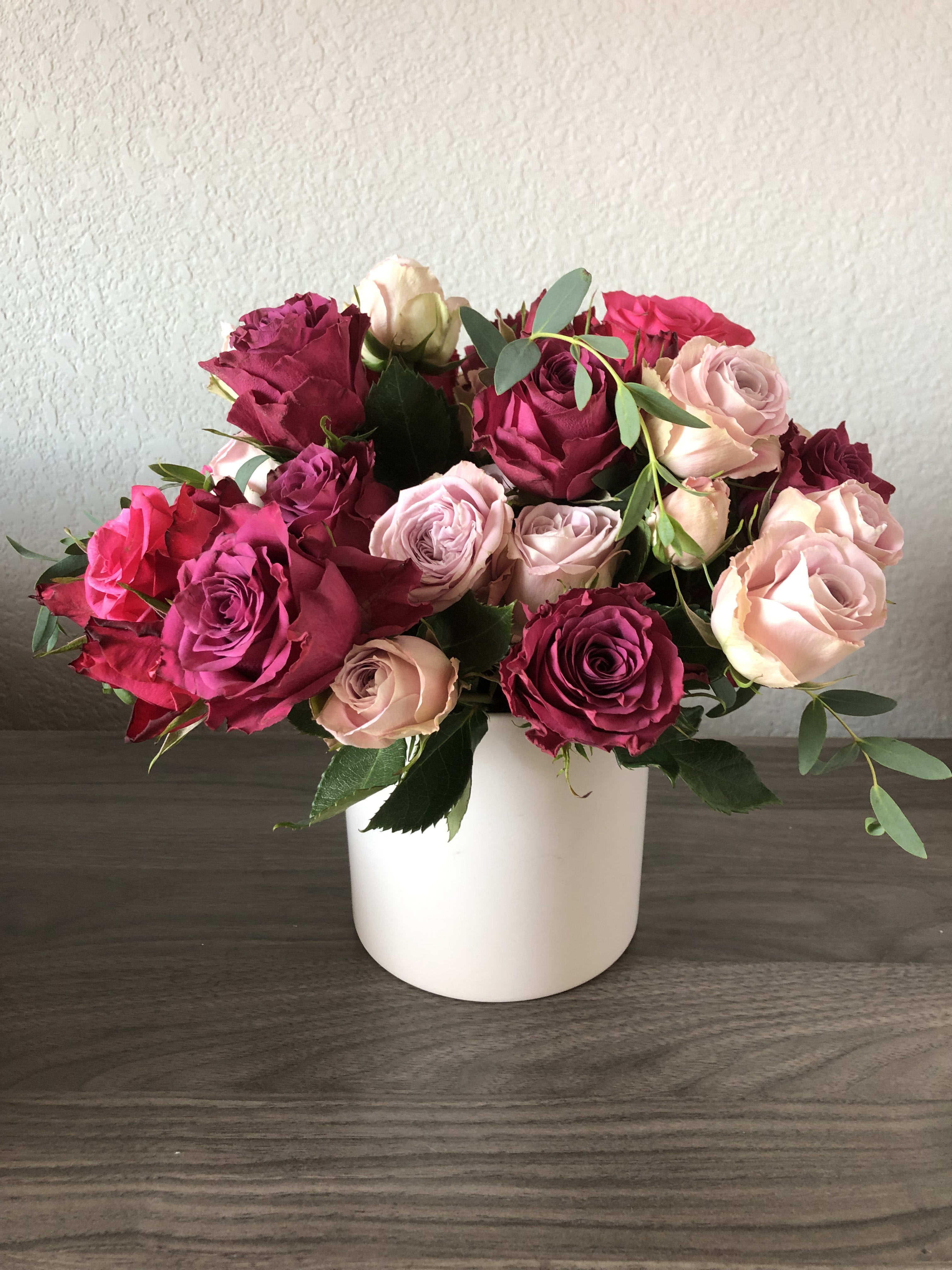 Bright and soft.  - The perfect combination. Hot pink roses and pale pink roses…some would call them magenta! Beautiful variety of roses. 