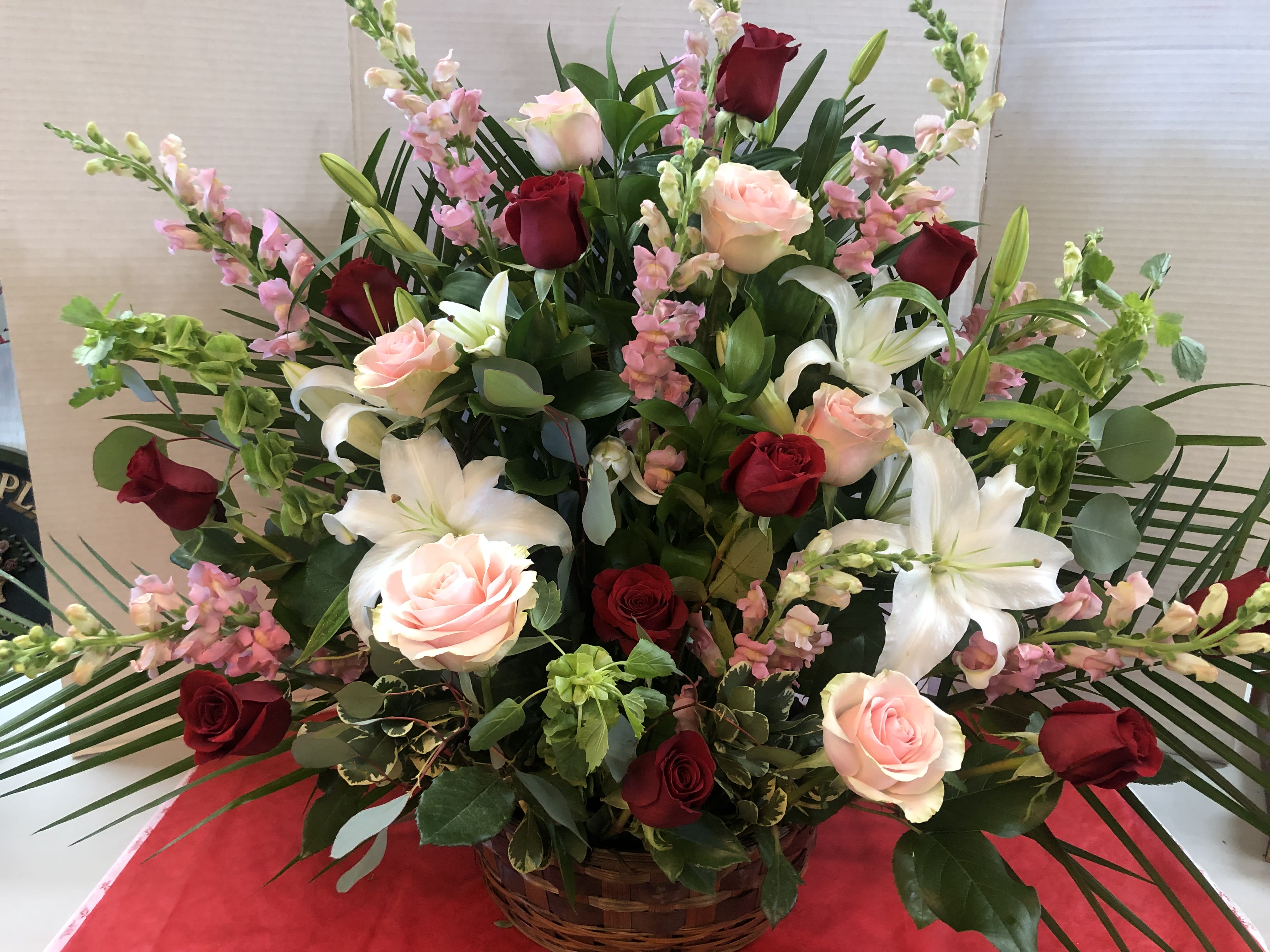 Eternal Basket - Pink Roses , Pink Snapdragons, White Lilies, Lisianthus , Eucalytus, Assorted Fancy Greens