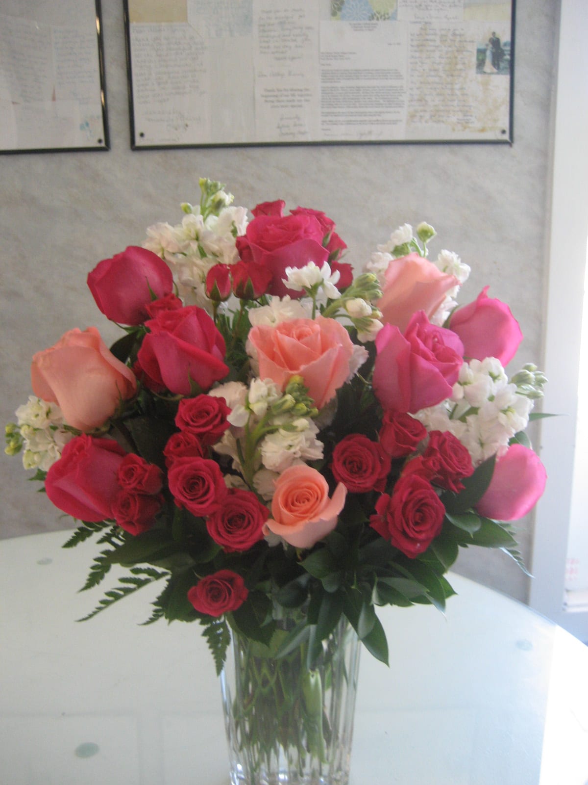Pink Love Bouquet  - Light Pink and Dark Pink Roses come beautifully arranged in a glass vase with greenery.  Great for any special occasion, including Mother's Day and Valentine's Day!