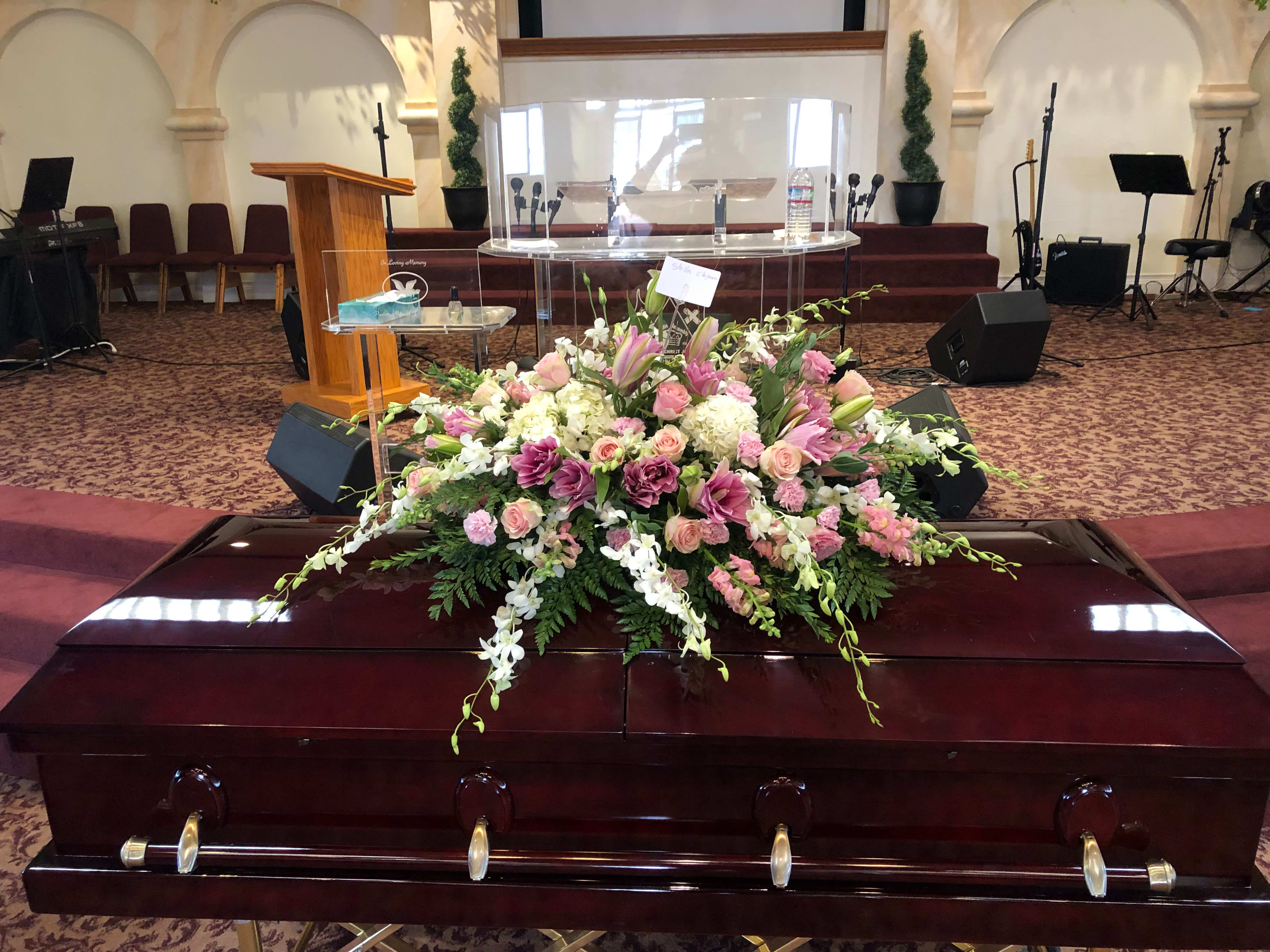 Pink spray casket  - Beautiful pink spray casket Three different sizes  Medium  Large  Extra large 