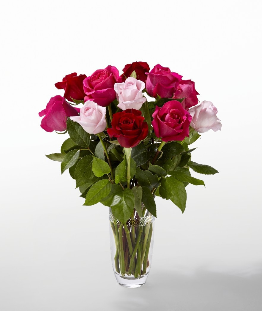 The FTD Love Always Bouquet by Vera Wang - FTD proudly presents the Love Always Bouquet by Vera Wang. Celebrate Valentine's Day in style with this stunning rose bouquet brought together by none other than style icon, Vera Wang. Rich red roses, hot pink roses, and pale pink roses are arranged to keep the eyes moving from bloom to bloom, creating a gorgeous Valentine's Day fresh flower bouquet. Presented in a modern clear glass vase to let each bloom truly shine, this rose bouquet is ready to create that perfect impression on your special recipient this coming February 14th.