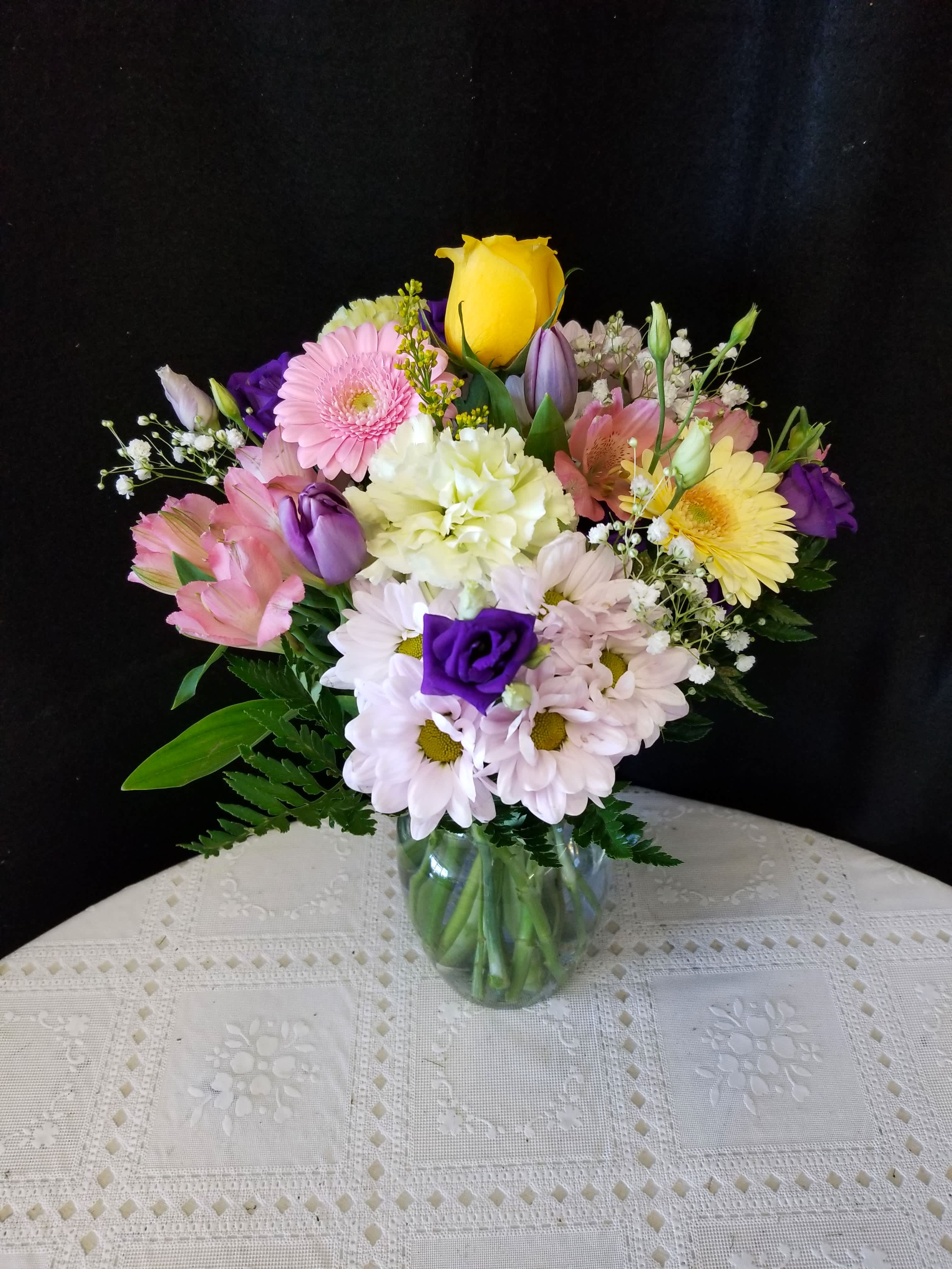 Tender Thoughts Bouquet Tender Thoughts Bouquet - An assortment of flowers in cheerful tones to tell that special someone you're thinking of them. Colors may vary from the picture above.