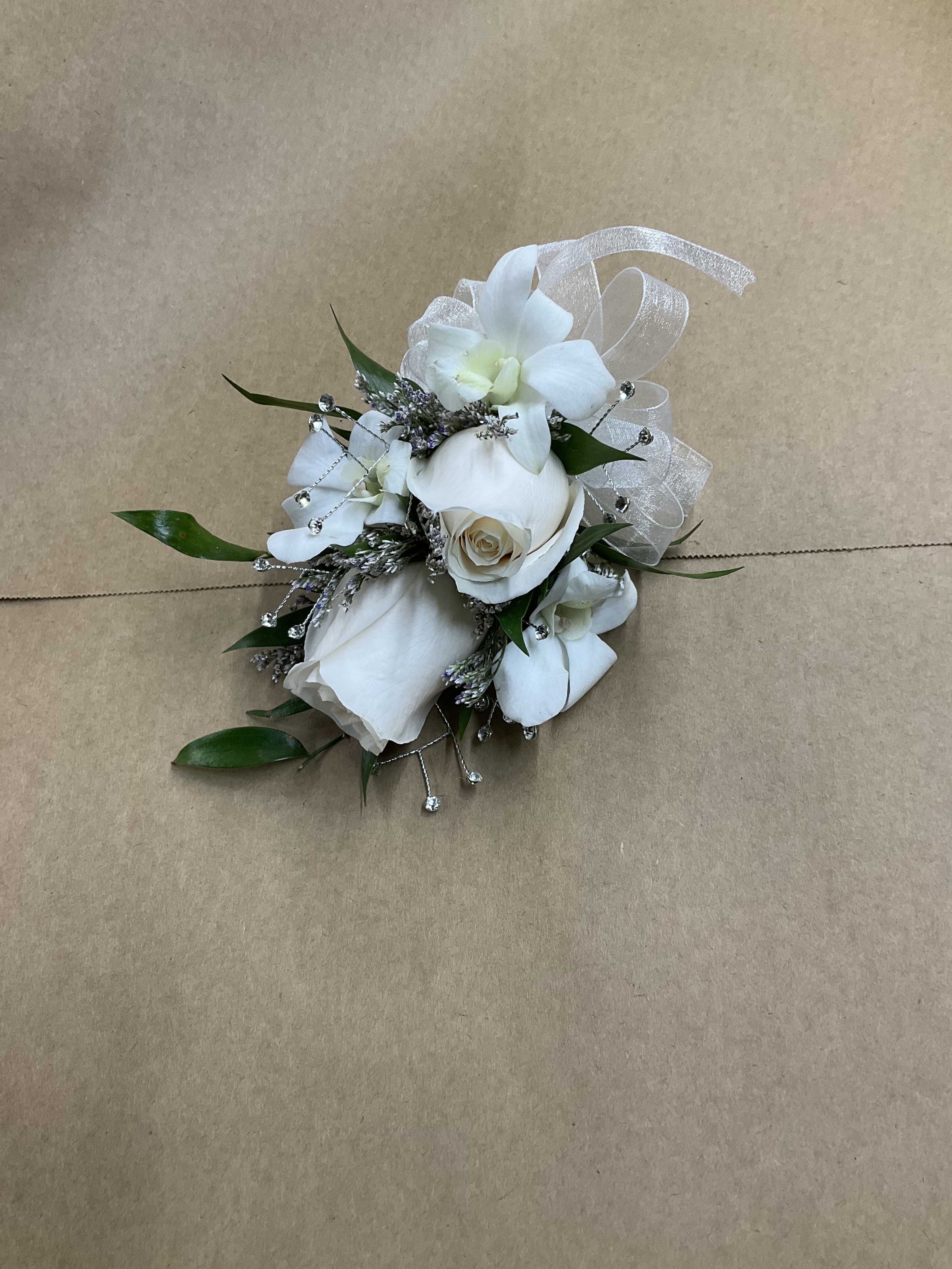 Sparkling corsage  - A beautiful rose corsage with dendrobium. Perfect for your prom wedding or any event.