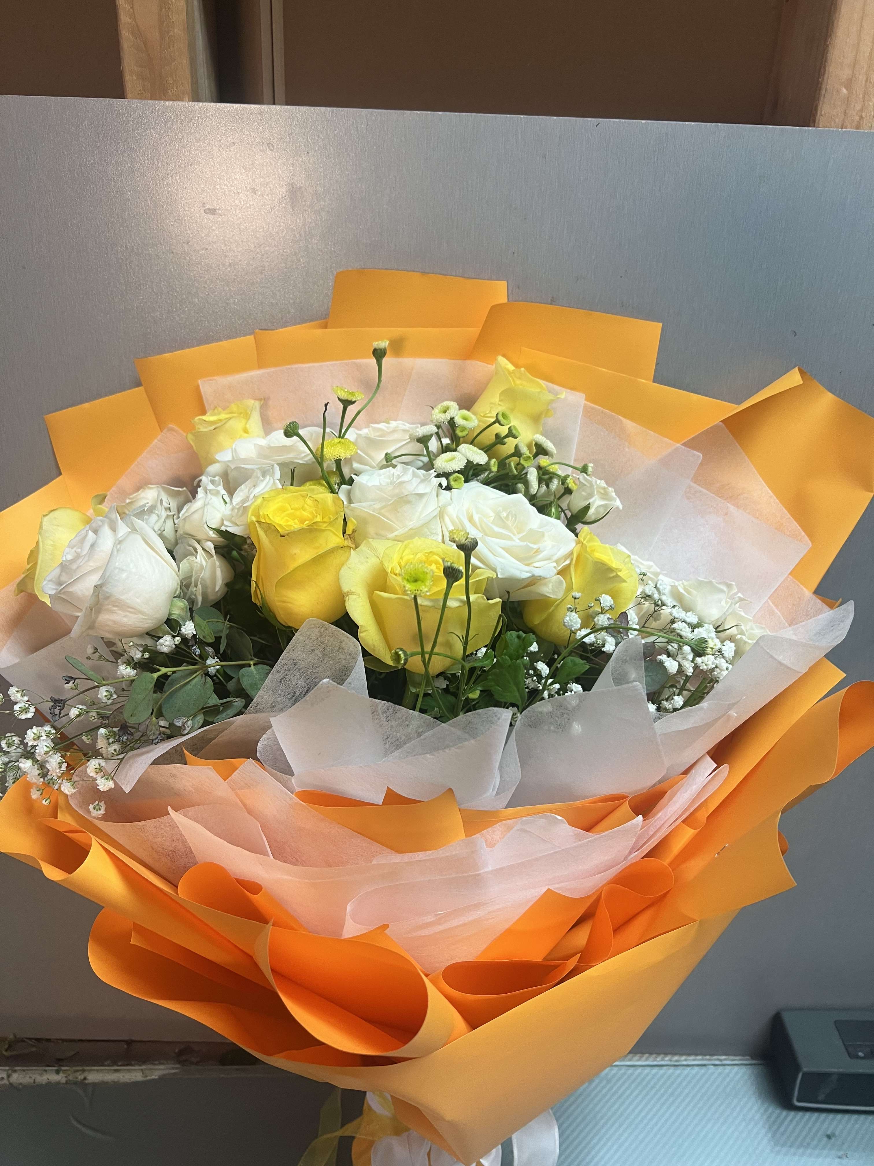 Mix Color Wrapped Flowers - AS SIMILAR AS POSSIBLE  Substitution based on season, flowers availability or any unforeseen or uncontrollable circumstances