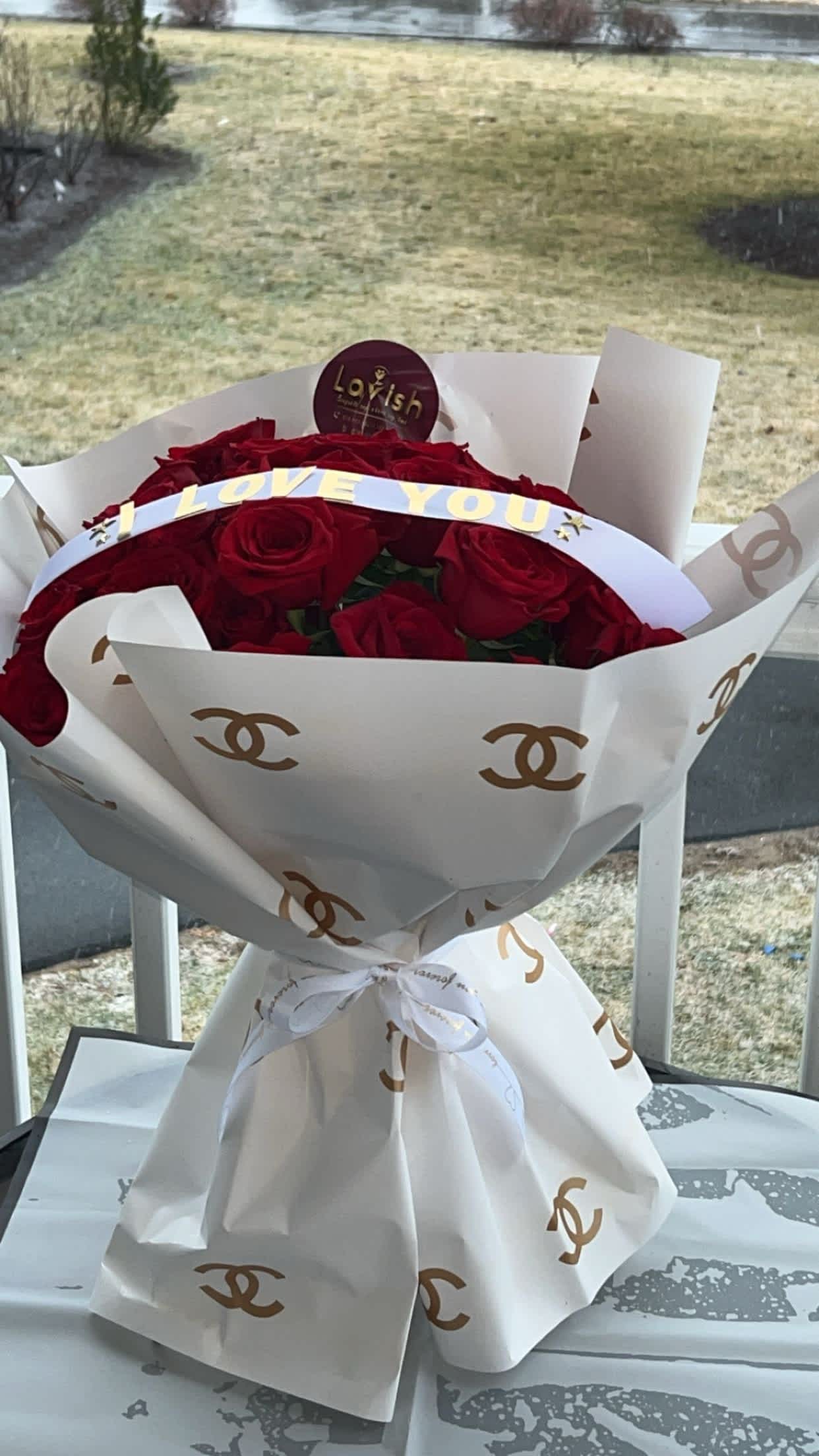 Red roses  - red roses wrapped with our lavish channel paper 