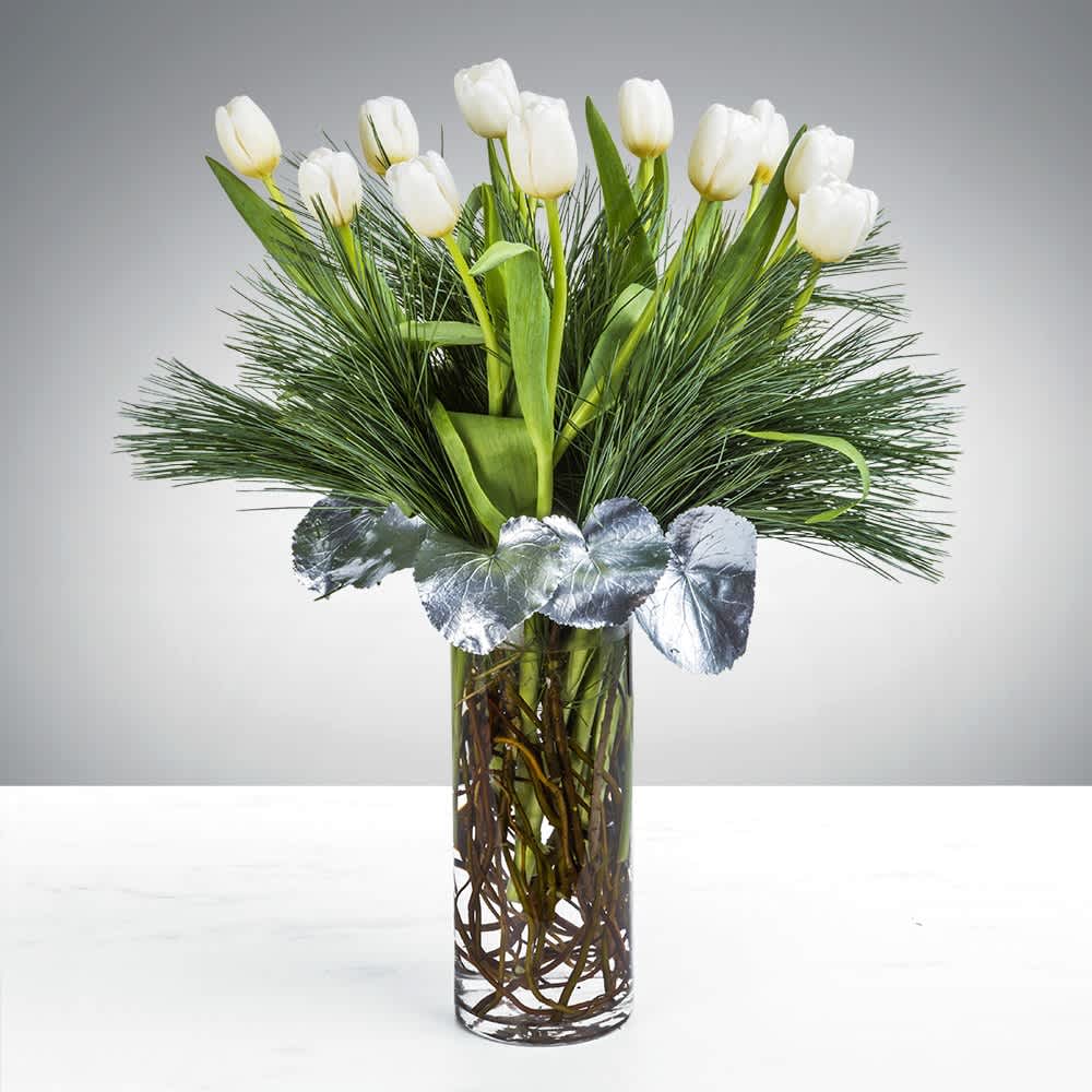 Tulips by the sea Tulips by the sea - People spend lifetimes searching for inner peace. We’re not going to say the Tranquil Tulip arrangement will lead you immediately there. But, on the other hand, who wouldn’t want a bit of tulip comfort on their meandering path to lifelong serenity. Gift this arrangement to someone who deserves a bit of tranquility in their life this holiday season.