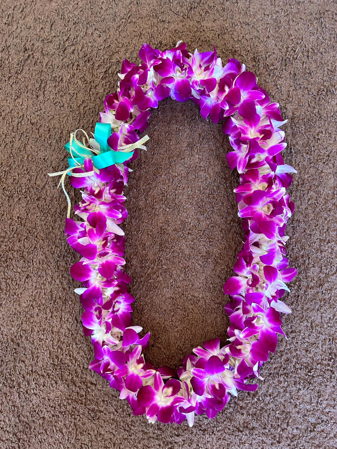 Purple Double Orchid Lei - Fresh Purple Orchid Lei with double layers of orchids to wear around the neck. Ribbon color is customizable to order.