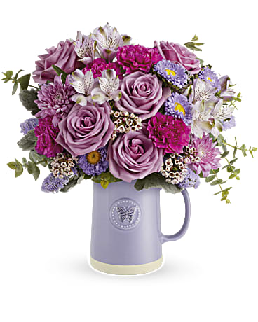 Sweetest Flutter Bouquet - Gift  the artisanal charm she loves with the Sweetest Flutter glazed ceramic pitcher, adorned with embossed butterfly detail and a natural base, perfect for year-round use and sure to add a touch of elegance to any table setting.