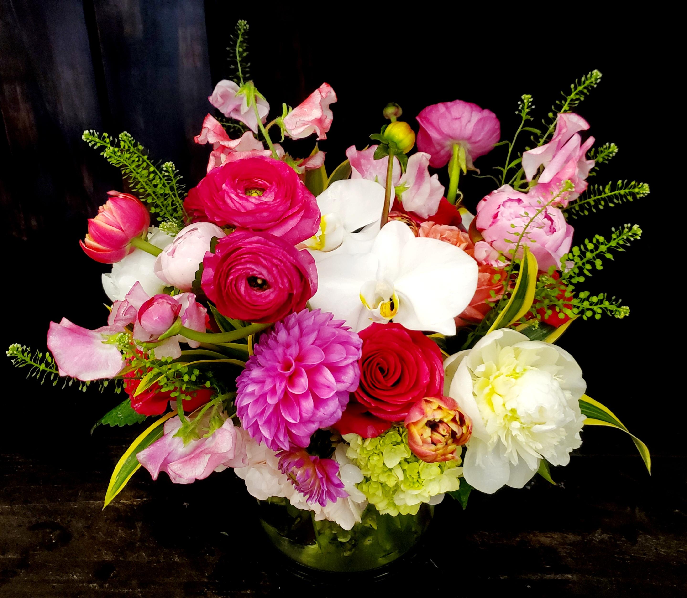 Hope Floats - This beauty has all the pretties! Show your love and make someone as happy as they can be with this shades of pink arrangement. 