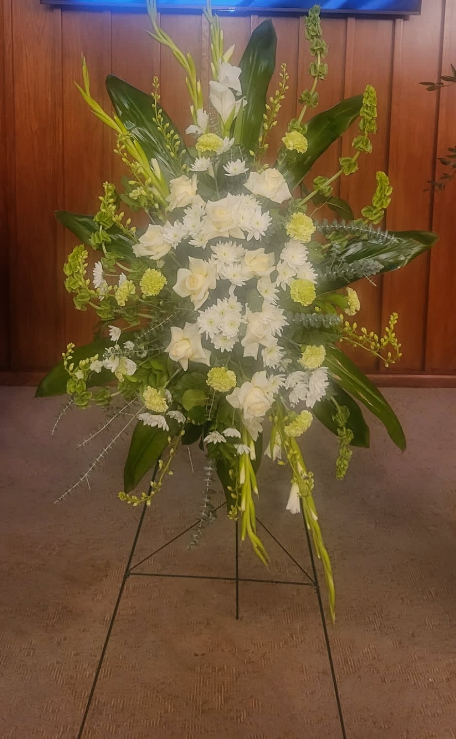 Celebration of Life Spray - An Graceful and Elegant expression for Celebration of LIfe, this magnificent white &amp; green floral spray radiates peace, admiration, and remembrance. Best choice for a memorable memorial. 