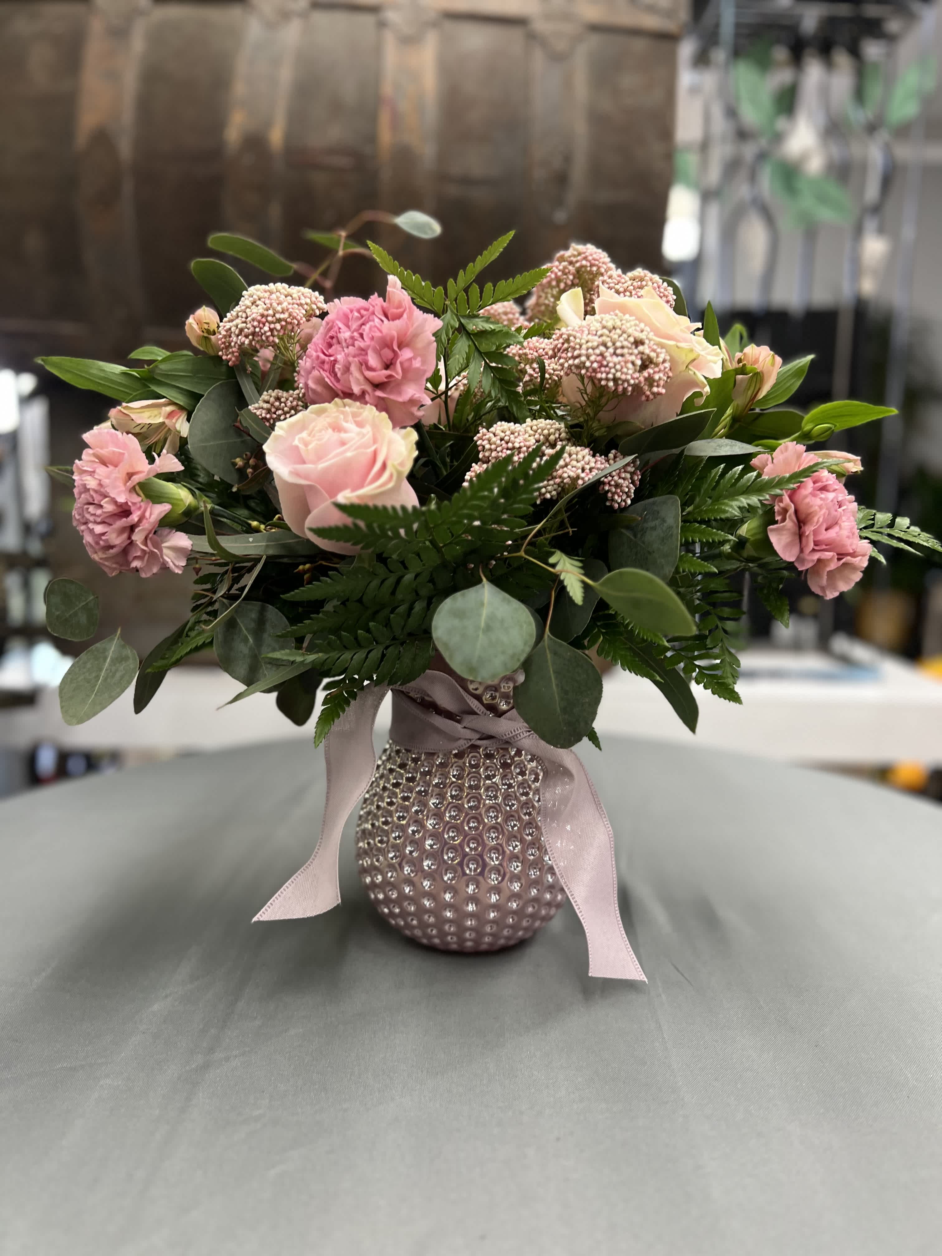 Pretty in pink - Beautiful mixed arrangements in colors of pink. Flowers may vary and have substitutions! 