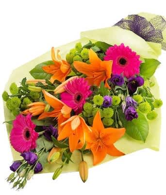 Vibrant Mix Presentation Bouquet - An eye catching florist choice bouquet that's simply bursting with colour.  Your flowers and foliage will be selected on the day by one of our expert florists. Please let us know when ordering if you have any special requests and we will try our best to accommodate them