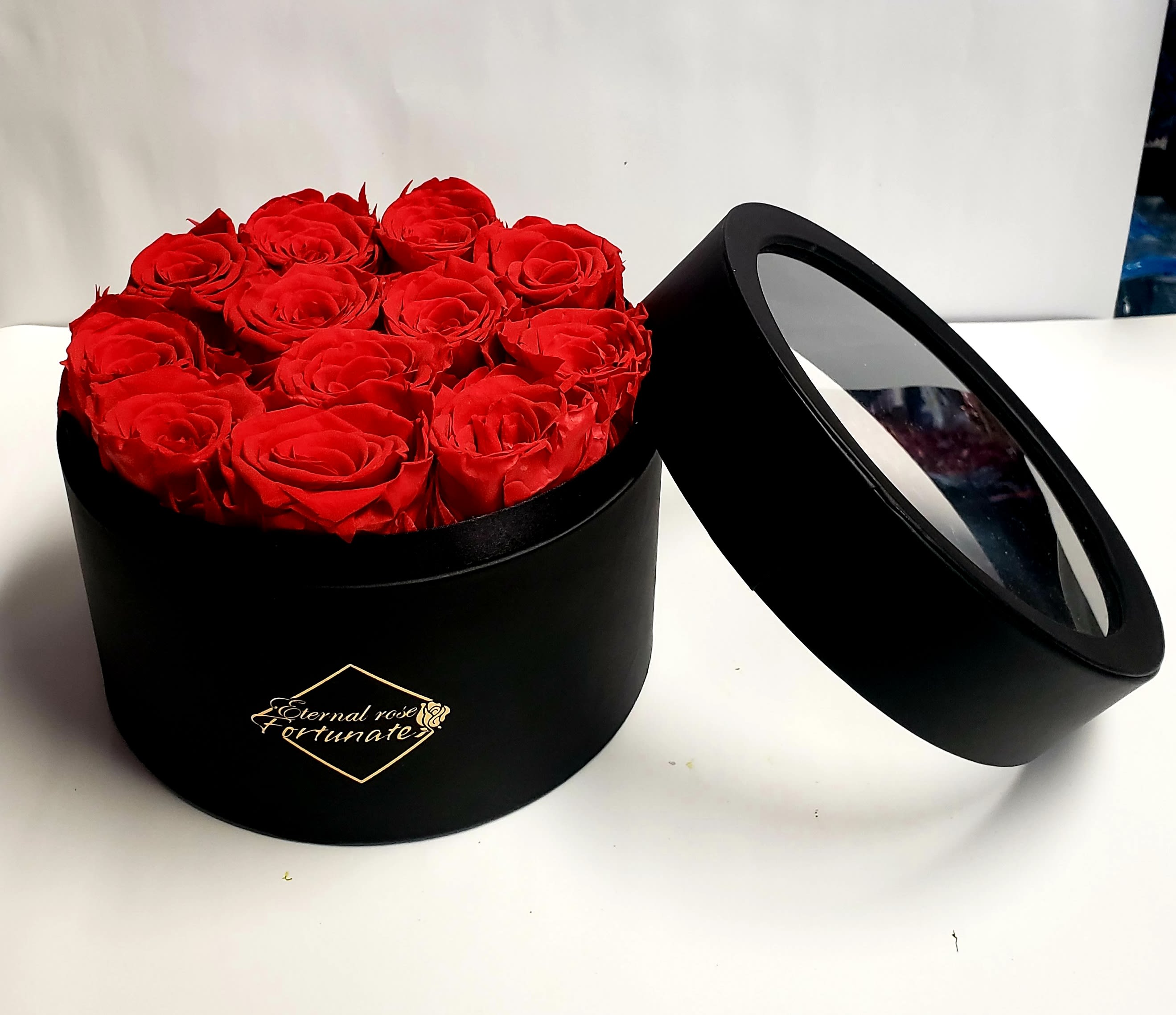 Eternal Preserved Roses Round Black Eternal Preserved Roses Round Black - 100% Real Rose - Our roses are hand-picked at peak freshness and carefully arranged in a leatherette box. The Box is of high quality. Long lasting Rose - Each rose undergoes an environmentally friendly cutting-edge method which allows them maintain their beauty and color for at least a year. No toxic ingredients, no risk of pollen allergy and no stinky smell. Elegant Display Box: We have specially designed this PU leather round box so you can see the colorful display of stunning rose buds right through transparent film, making them perfect for gift giving. Ultimate Gift for Her – Our Box arrangement serve as a lovely gift that will not only leave a lasting impression, but will also add the perfect dose of elegance and beauty to a room. Maintenance-Free Rose: no watering, no need for sunlight, easy care for years of enjoyment.