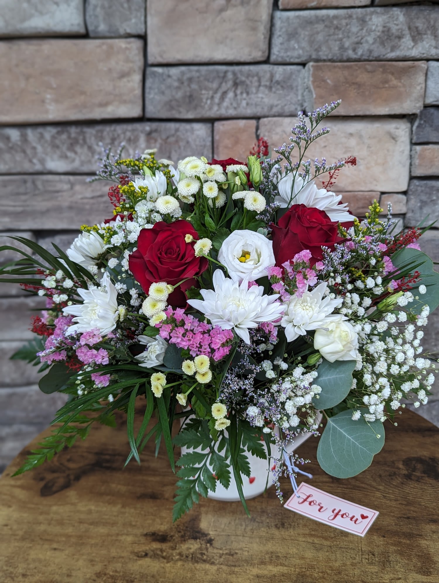 Coppa di Fiori Coppa di Fiori - A delightful and unique floral arrangement, Coppa di Fiori is sure to charm and delight. This petite bouquet is presented in a beautiful Valentine’s Day cup or mug, making it a perfect gift for the occasion. The cup can be reused after the flowers have died, making it a sustainable and eco-friendly choice. The cup is made of ceramic and is dishwasher safe. The bouquet is available in a variety of colors, including red, pink, white, and yellow.