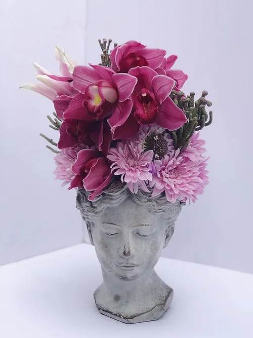Goddess Flower Arrangement - Our concrete goddess urn comes bursting with our most exquisite flowers. Standard size Delux Premium 