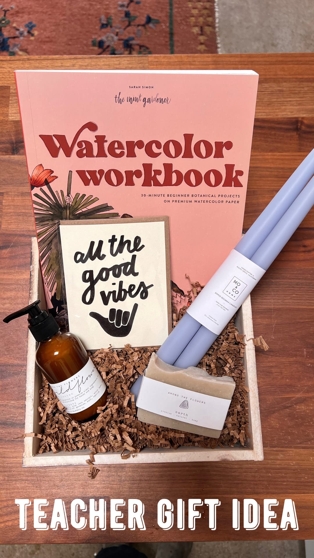 Teacher Appreciation Gift Set Teacher Appreciation Gift Set - beautiful gift set including Watercolor Workbook by The Mint Gardener Sarah Simon for tutorials on how to do beginner flower and plant watercolor painting. Set of two hand dipped beeswax candles made in Pacific Grove, CA by Mo & Co. Home. Among The Flowers Cold Pressed Soap Bar and Aloe Lotion in amber glass reusable bottle and Daydream Prints eco-friendly greeting card with biodegradable packaging. All beautifully set in wood box with recyclable paper filler. Get this teacher appreciation gift or birthday gift set delivered to you in Newport Beach, Laguna Beach, Irvine, Huntington Beach, Santa Ana and Tustin.