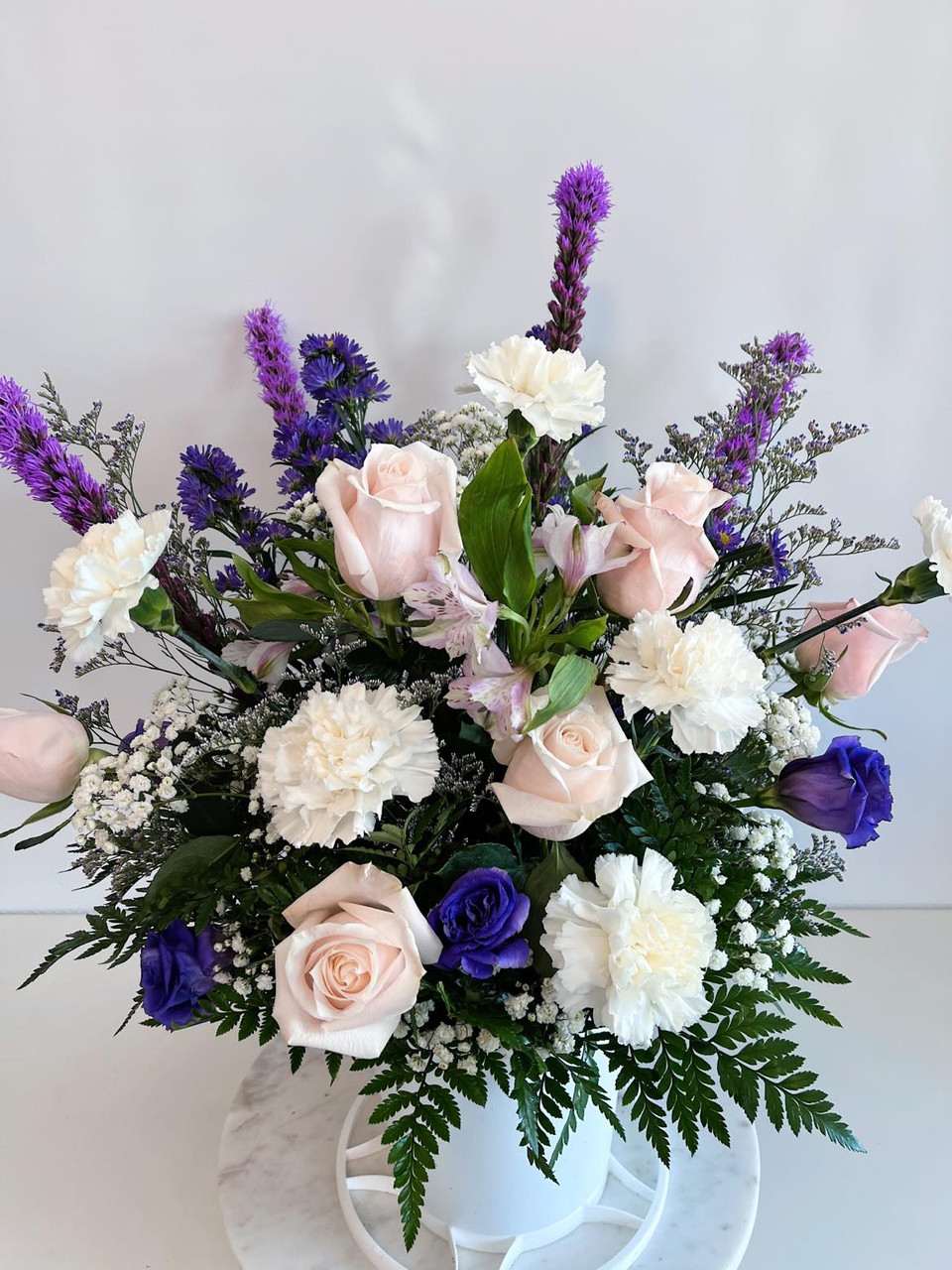Love Everlasting Love Everlasting - A serene and beautiful spray of clean white and luscious lavender flowers.