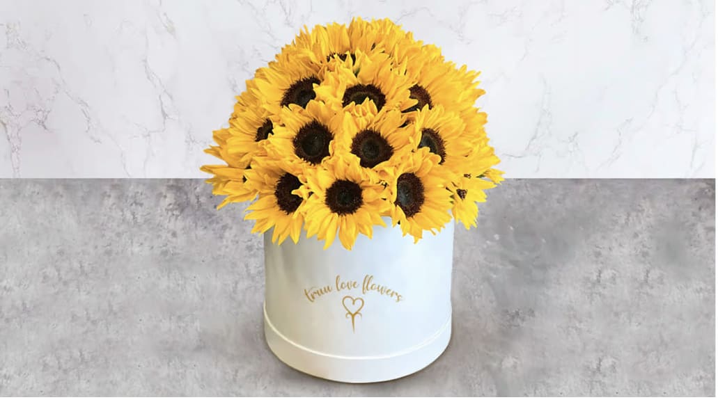 Sunflowers white Box  - this arrangement contains fresh Sunflower 