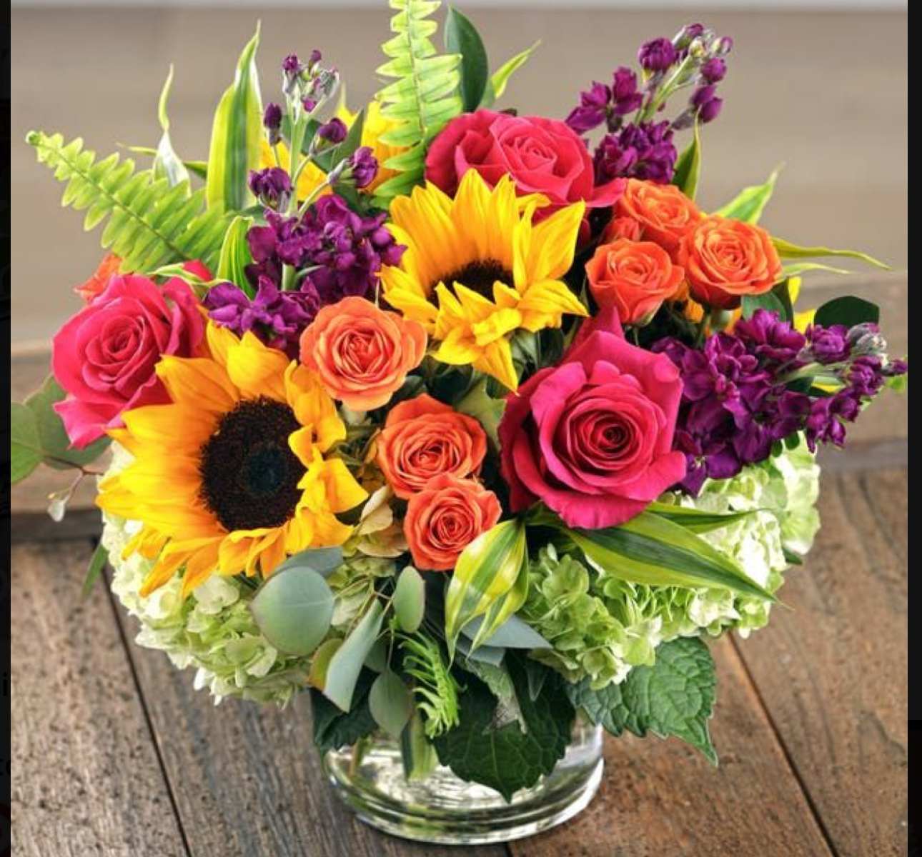 Bright Sun Bright Sun - Beautiful arrangement of pink sunflowers and foliage