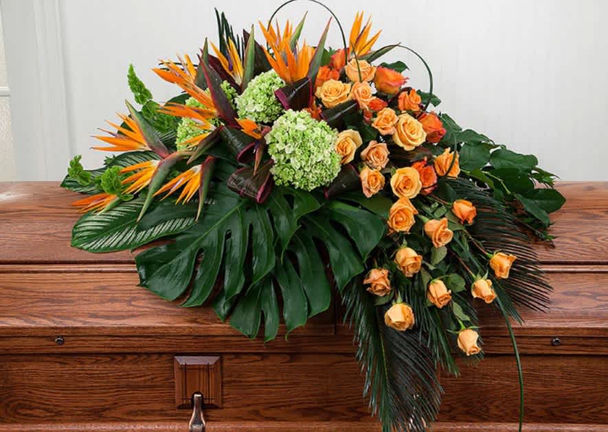 Sincerely Remembered - Exemplify exotic warmth and tender beauty with this artistic and breathtaking spray.  Pay tribute and loving honor to your loved one with sincere remembrance.