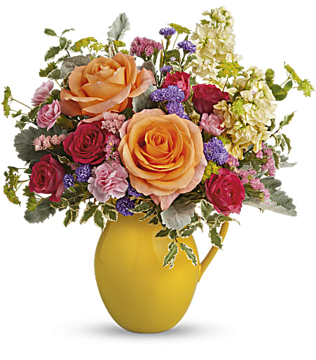 Teleflora's Be Bright Bouquet - Pour on the sunshine! Filled with radiant roses, this cheerful yellow pitcher sprinkles happiness on any occasion and makes a great food-safe addition to any home.  Standard size approximately 15&quot; W x 16&quot; H