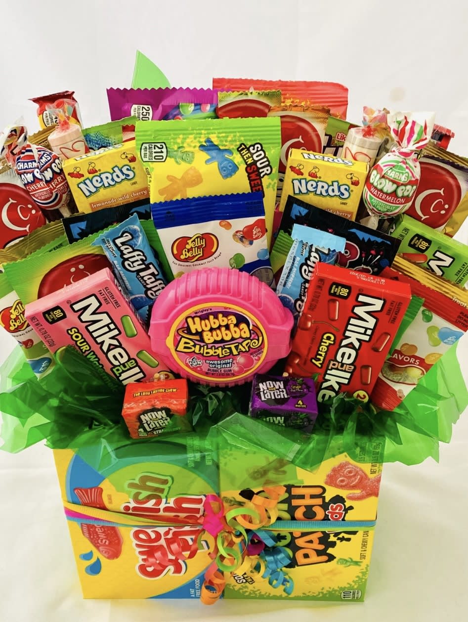 Hubba Bubba Candy Basket Hubba Bubba Candy Basket - Look at all that CANDY!!!! From tip top to the bottom of this gift basket, it is covered with candy favorites! Feel free to list your favorites in your special instructions to customize your candy order!