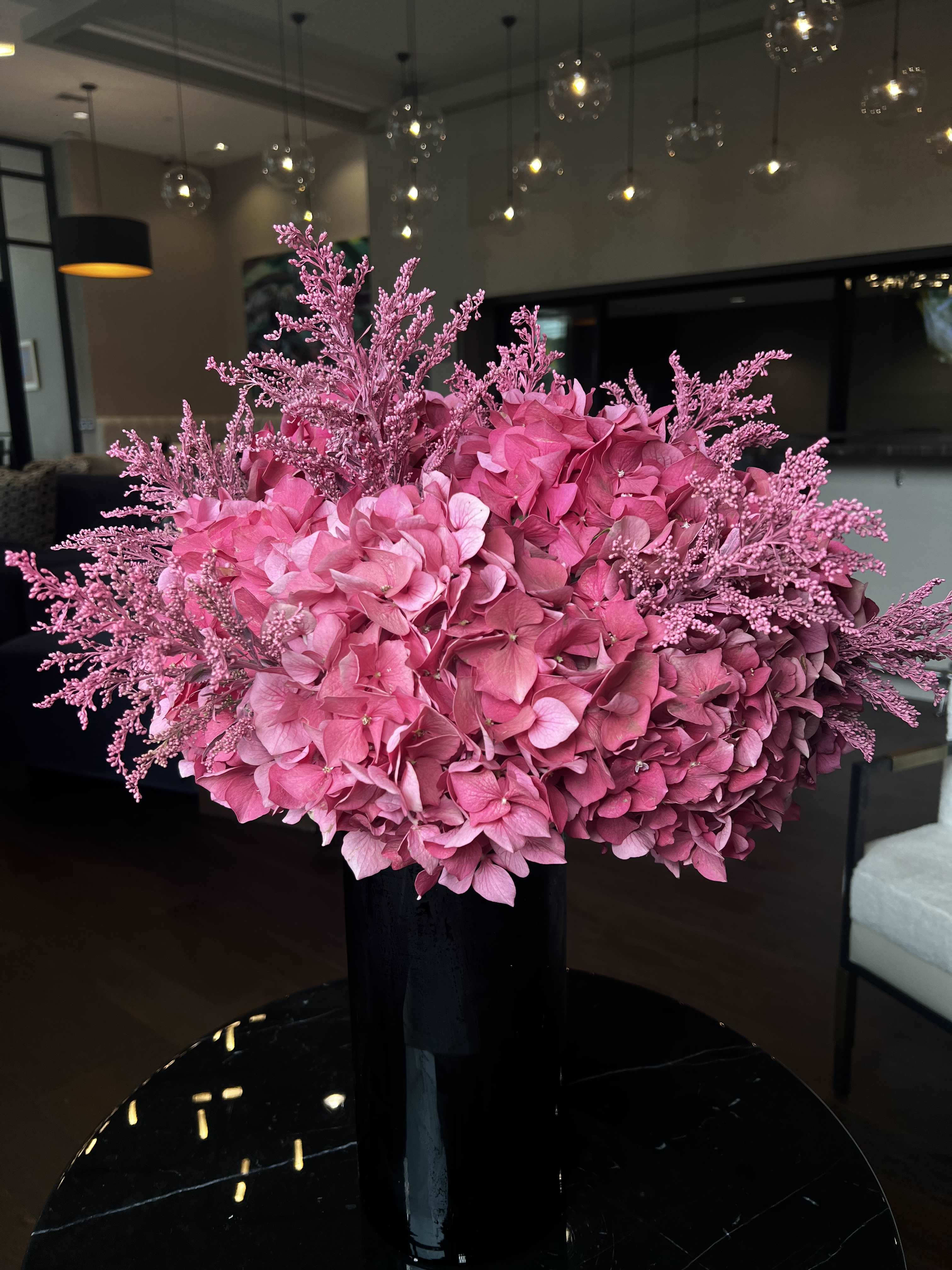 Pink hydrangea  - Pink hydrangea in a black vase.