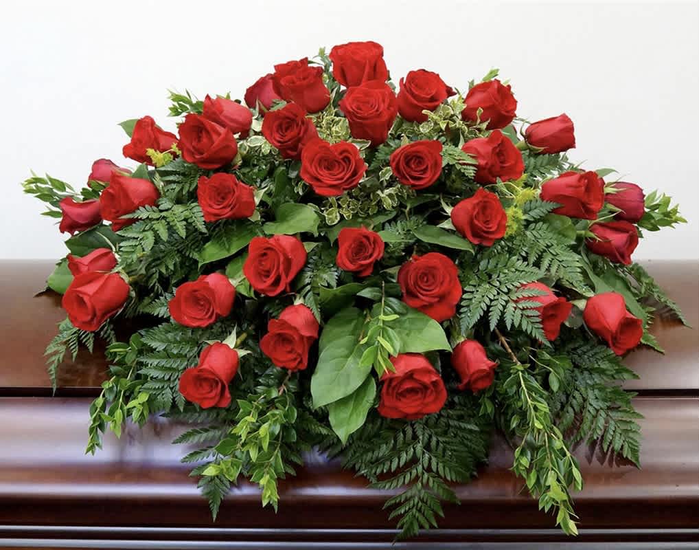 Classic Red Rose Casket Spray Classic Red Rose Casket Spray - Express your love and devotion with the traditional elegance of this stunning red rose casket spray. The impressive display features a generous array of bold, beautiful blooms.