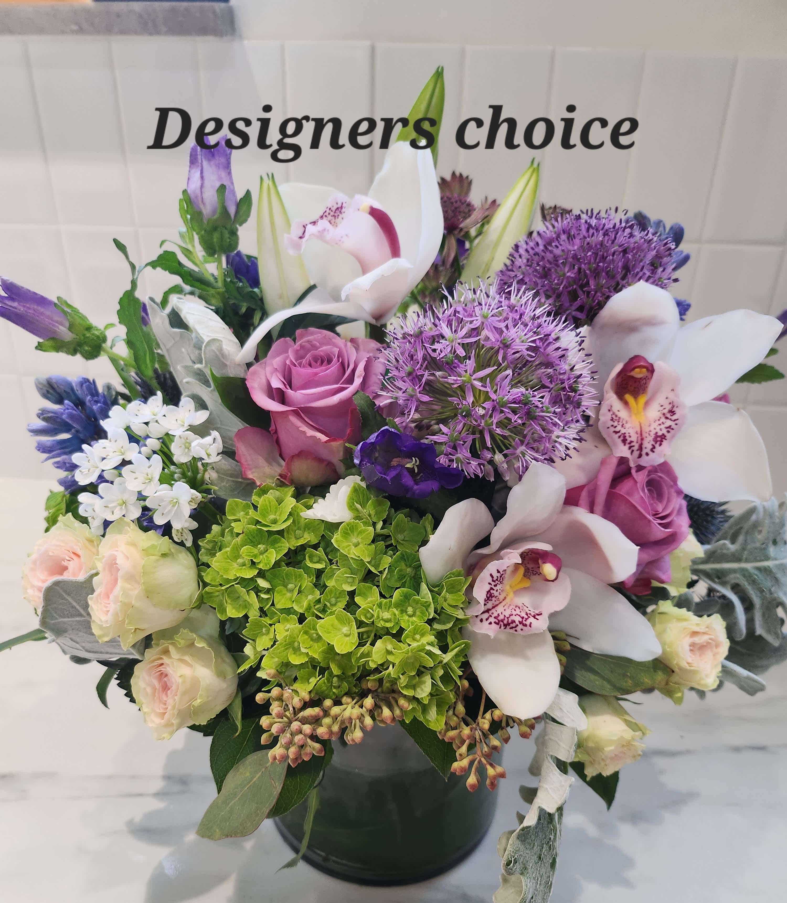 Designer's Choice- Pastel Designer's Choice- Pastel - Designer's Choice - using the best available flowers. We have peonies, lilacs, lilies, roses and many others. We promise you our finest work!