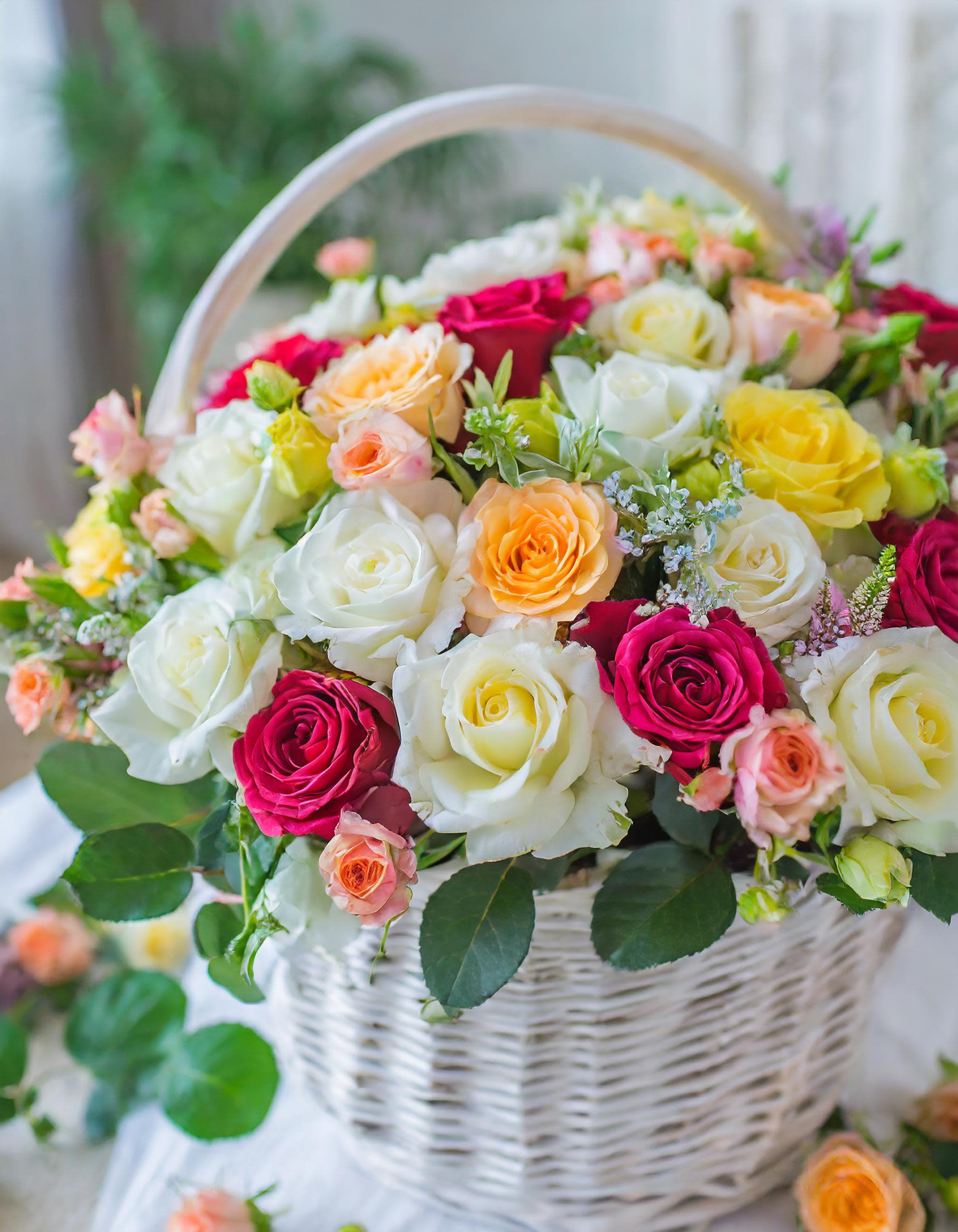 Enigmatic Blooms  - The lovely spring color scheme, displayed in a basket of flowers, radiates beauty and positivity, instantly brightening any space. Embrace joy with this delightful arrangement!  
