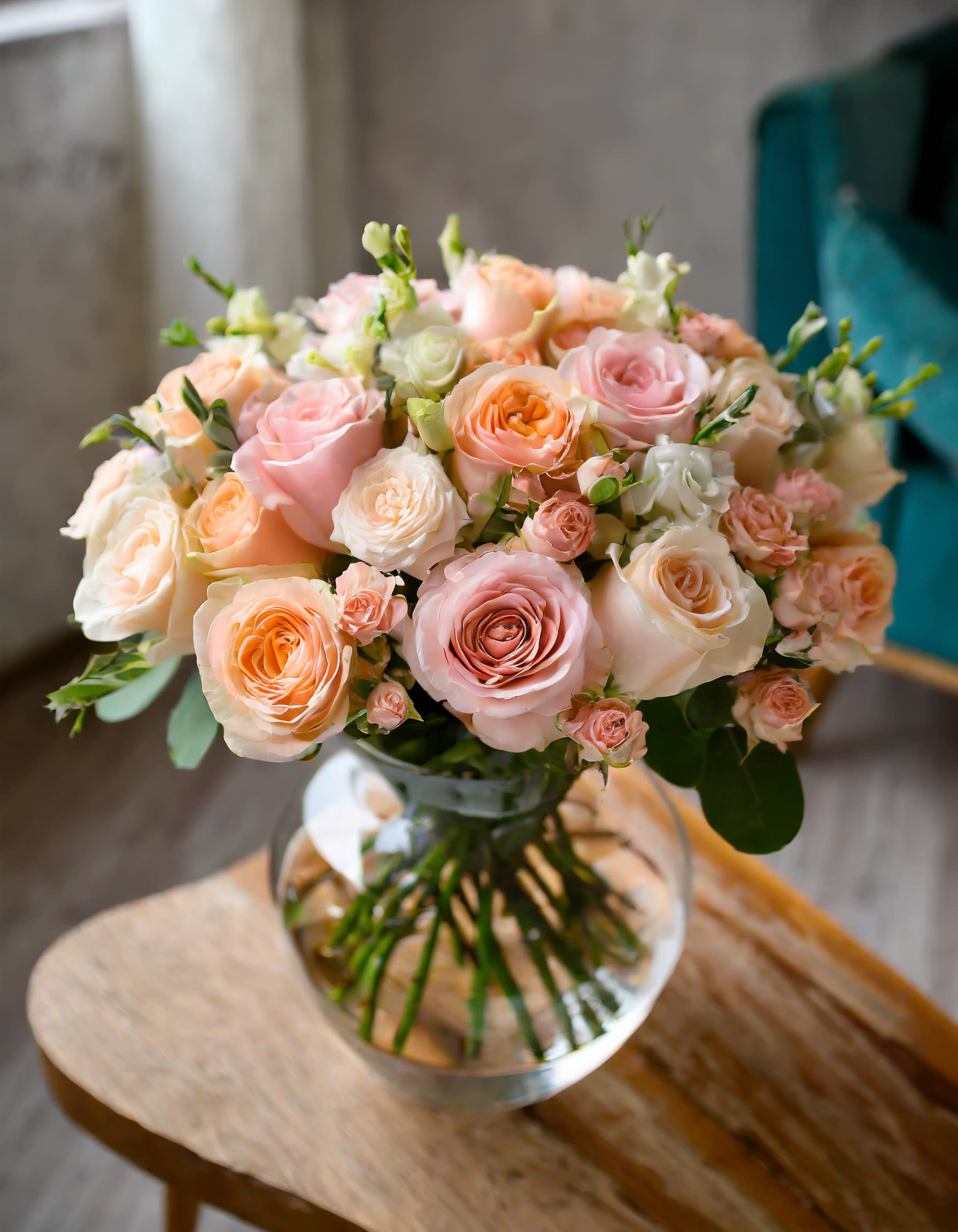Blush Garden - A peach-inspired bouquet blends flowers in warm hues, creating a gentle and elegant composition in a clear vase  Disclaimer: ALL IMAGES PROVIDED AT DELUXE PRICE Photos and visual presentation of the products represent an overall style, look and feel, which we may not be able to identically replicate in some instances.   Recommended for: Love and Romance, I Love You Flowers, Anniversary, Proposal,  Romantic Gift, Birthday, Get Well Soon, Celebrations, Best Wishes, Thank You, Congratulations, Just Because, New Baby, Everyday