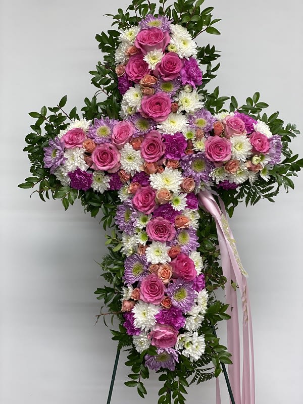Resurrection Cross Resurrection Cross - A beautiful cross with bright seasonal blooms. Each unique in its own design.