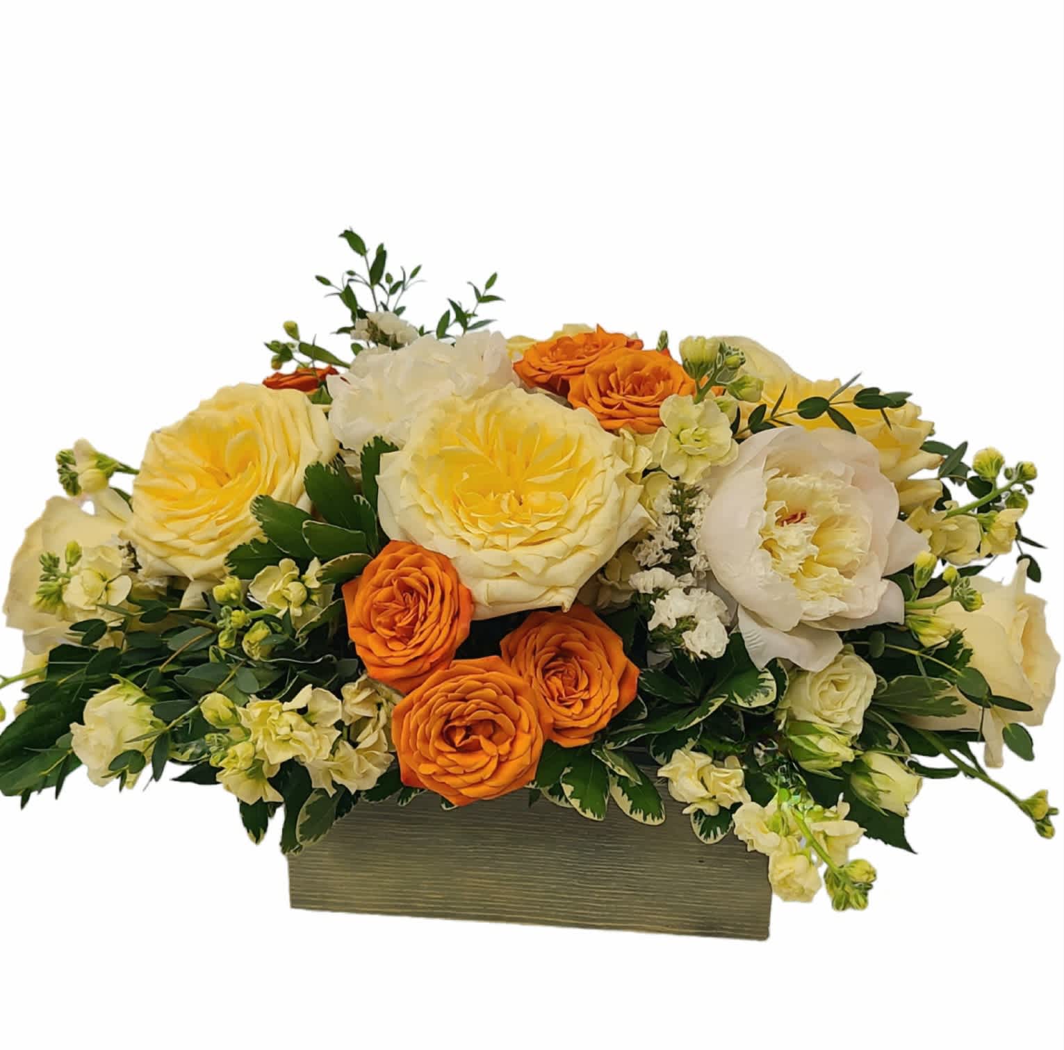 Sweet And Sassy - This chic arrangement is the ideal gift for the trendsetter in your life. Orange, peach and cream colors come together in perfect harmony.