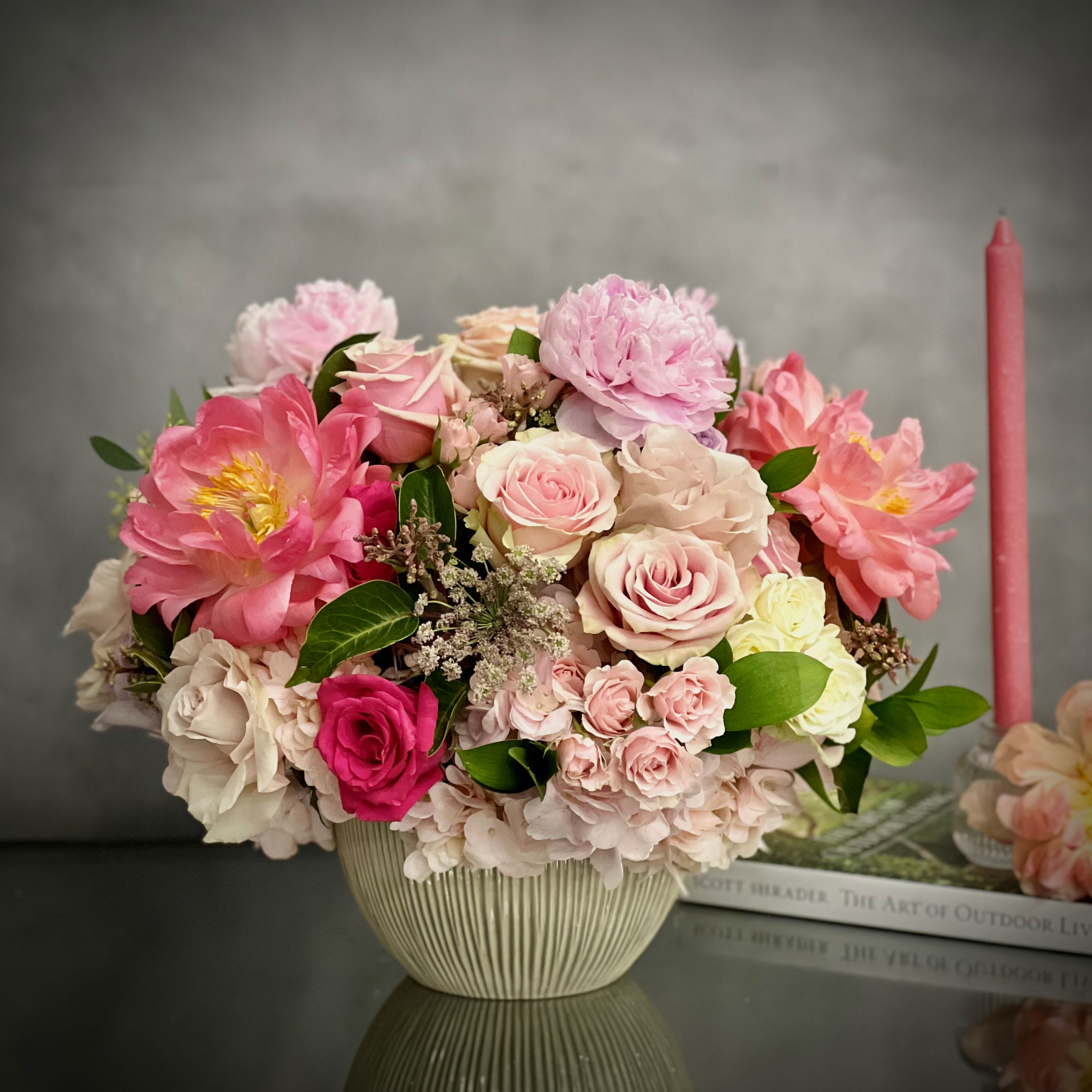 Wild Bowl - Pasadena Florist - This round dish is abundantly filled with lovely Roses of varying hues and peonies. Dainty clusters of light pink Hydrangea add to the texture and fullness of this precious design. Send your sweet sentiments with this special gift. A beautiful and current interpretation of a classic gift, this gorgeous bouquet of Luscious Roses and peonies surrounded by light pink Hydrangea is sure to bring joy and delight your special someone. Send your sweet sentiments with this breathtaking gift!