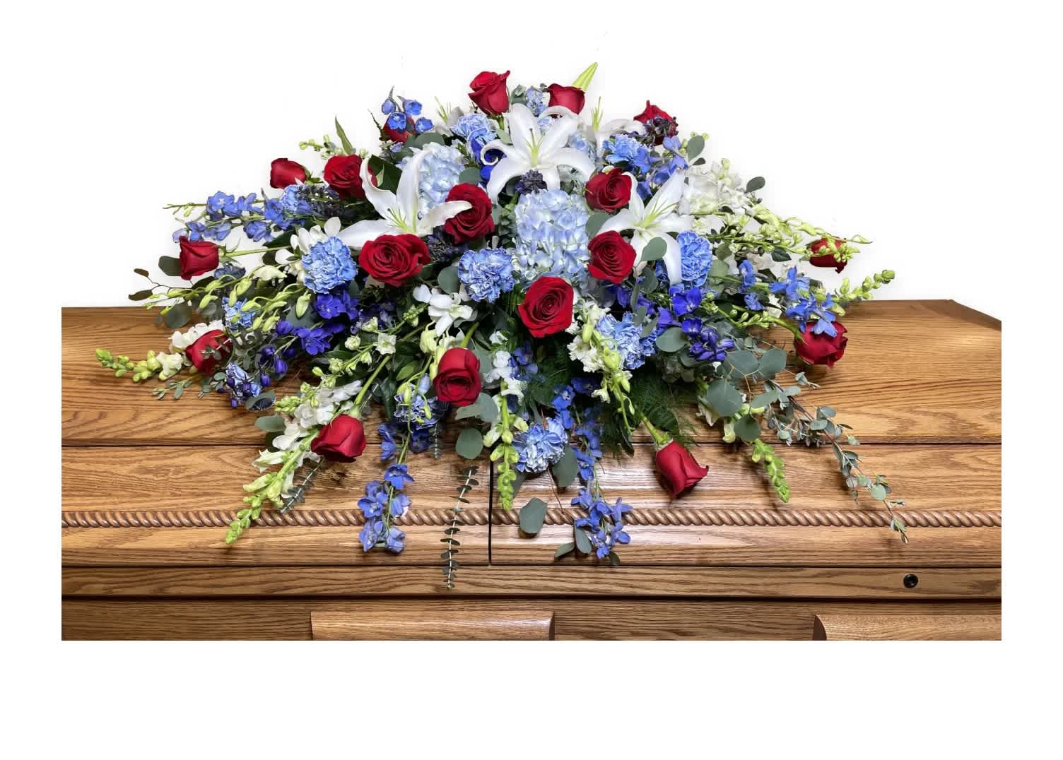 patriotic half casket cover - Honor a life so beautifully lived with a proud display of patriotic red, white and blue, creating a fitting final tribute for the funeral services.Our half casket cover, crafted with care and artistry by our expert florists with blue delphinium, white roses, and accented with a stunning blue hydrangeas, is an unforgettable way to commemorate a lifetime of loving devotion.