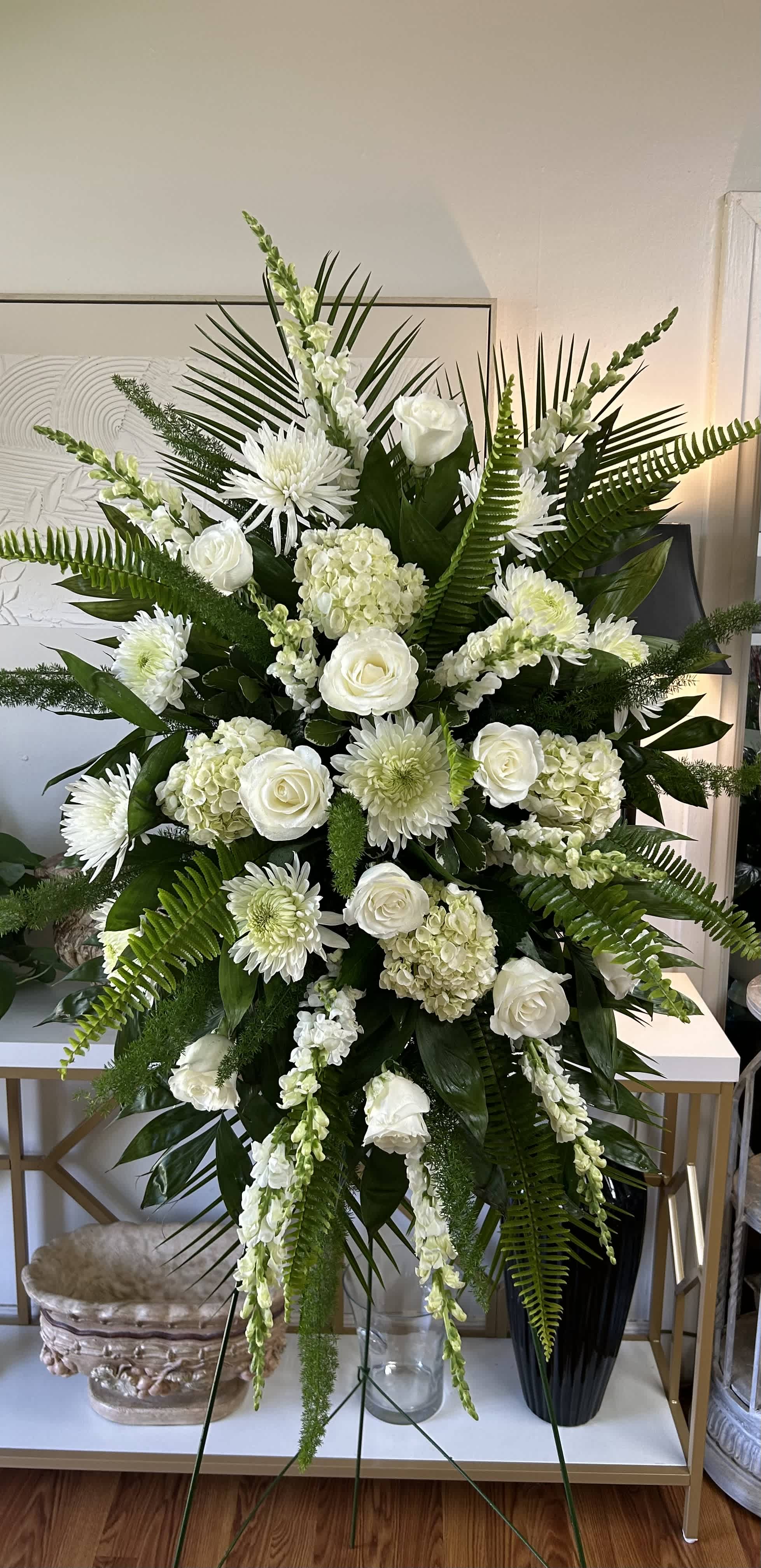 Love and Sympathy Spray  - All white funeral spray  Flowers include snapdragons, hydrangeas, chrysanthemums, and roses