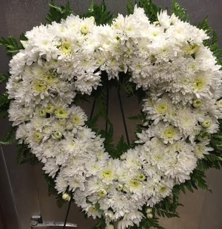 sympathy heart in white sympathy heart in white - open heart wreath with white cushions