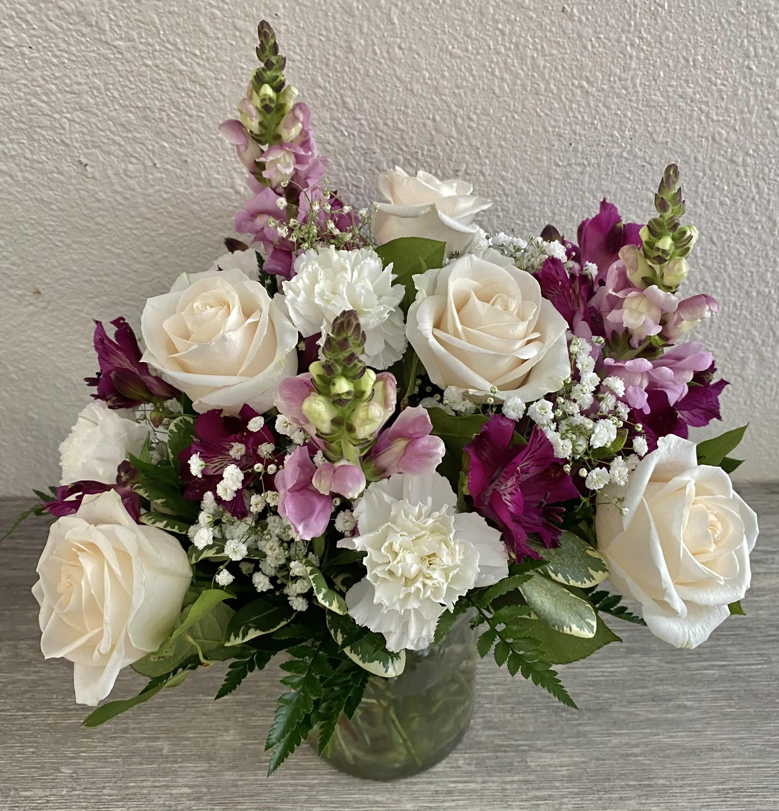 Everlasting Love Everlasting Love - White roses, white carnations, purple alstroemerias, purple snapdragon, baby’s breath