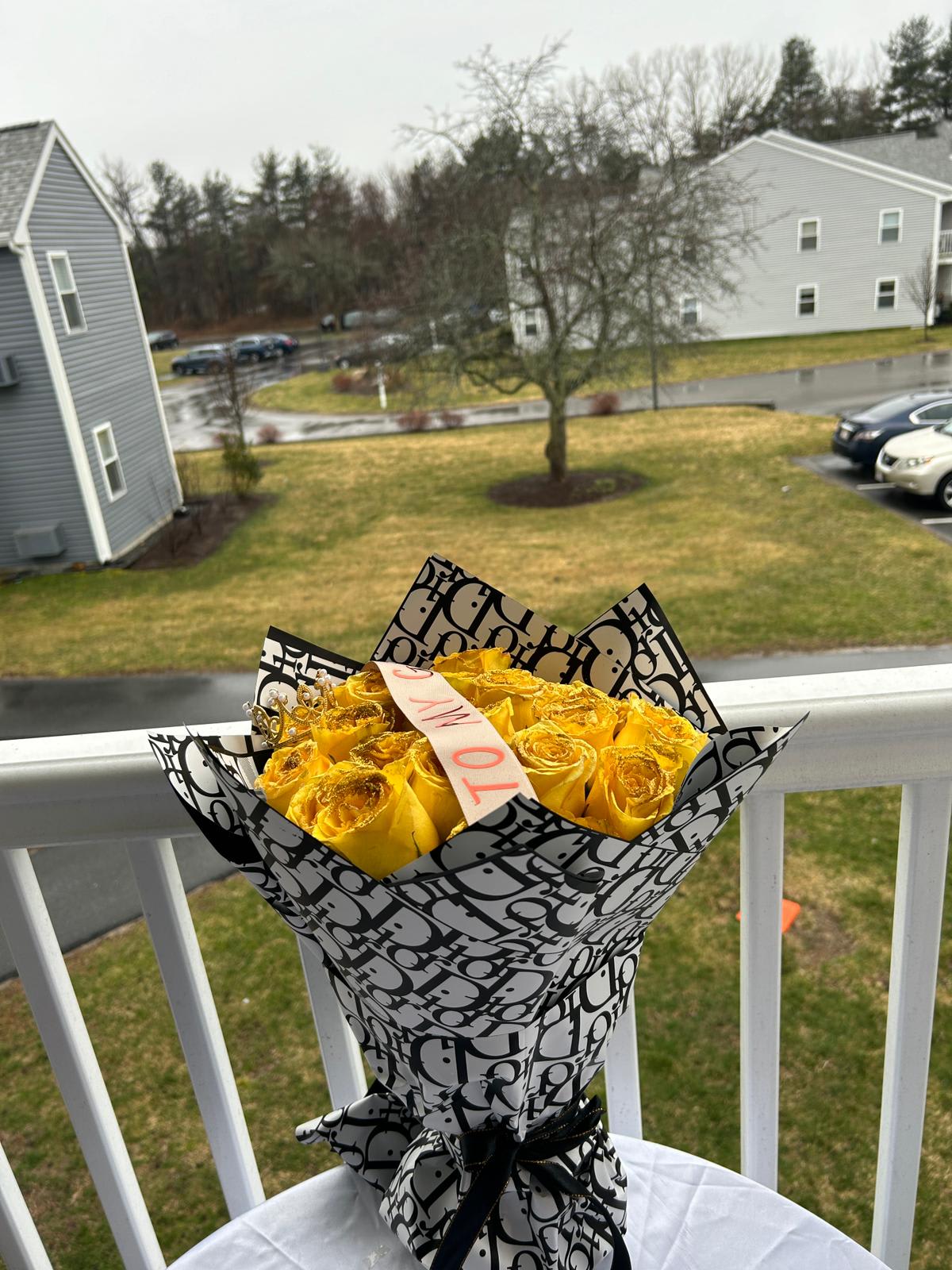 Yellow roses - Yellow flowers wrapped in a luxurious Dior wrapped paper