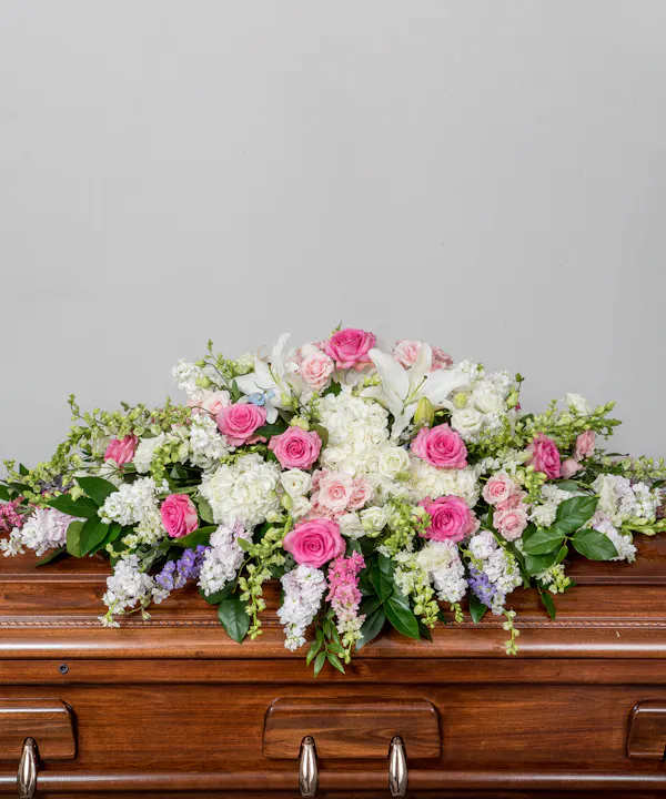 Serene Blessings half Casket cover - The ultimate symbol of grace, love and admiration, soft pink &amp; white are a sentimental way to honor someone who was deeply cherished. Our half casket cover, The memories shared with a loved one can help bring serenity after they are gone.