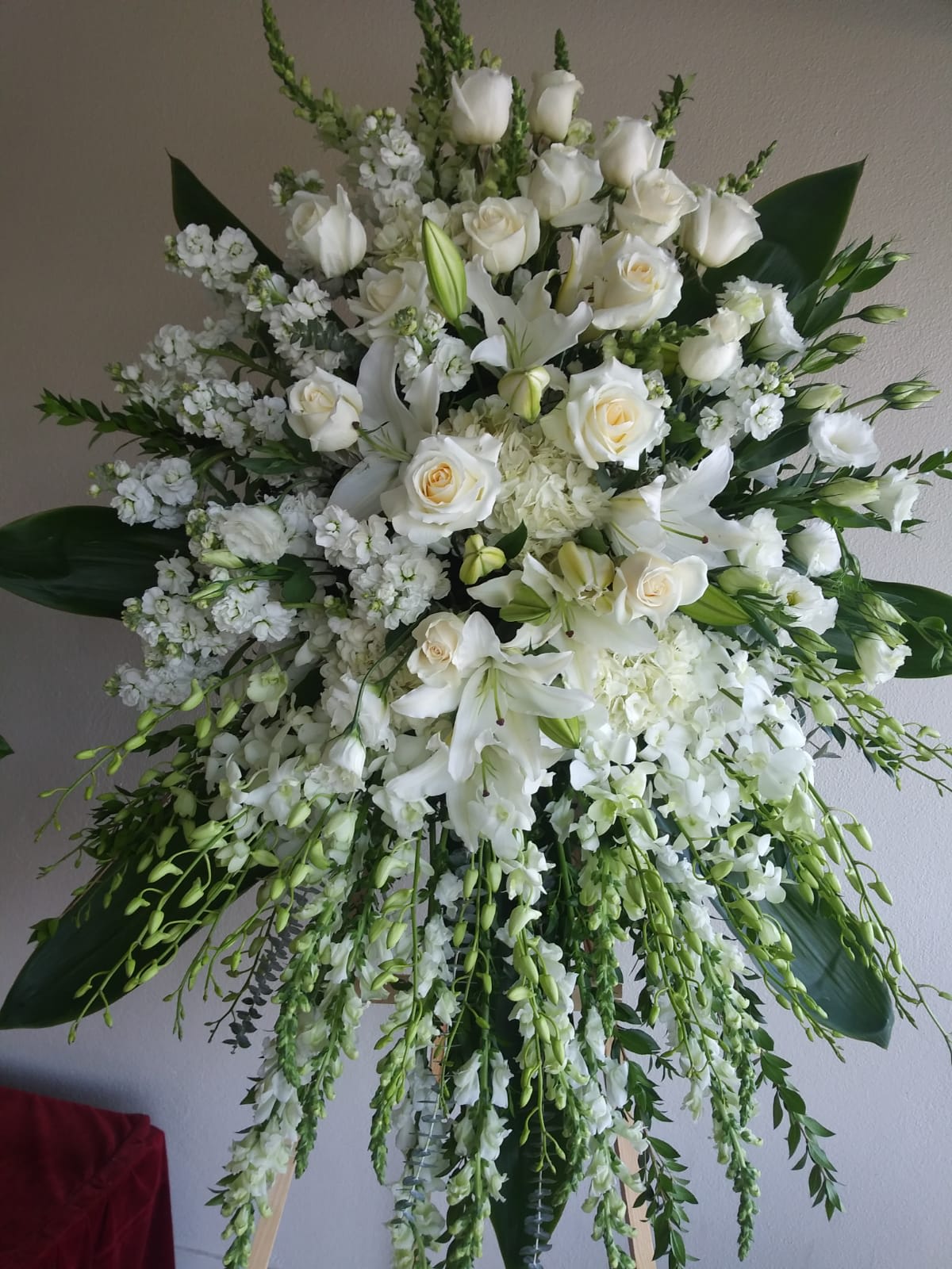 White Spray Arrangement White Spray Arrangement - This arrangement includes, snapdragon,roses,stock, white lilies, hydrangeas, white lisianthus, etc.