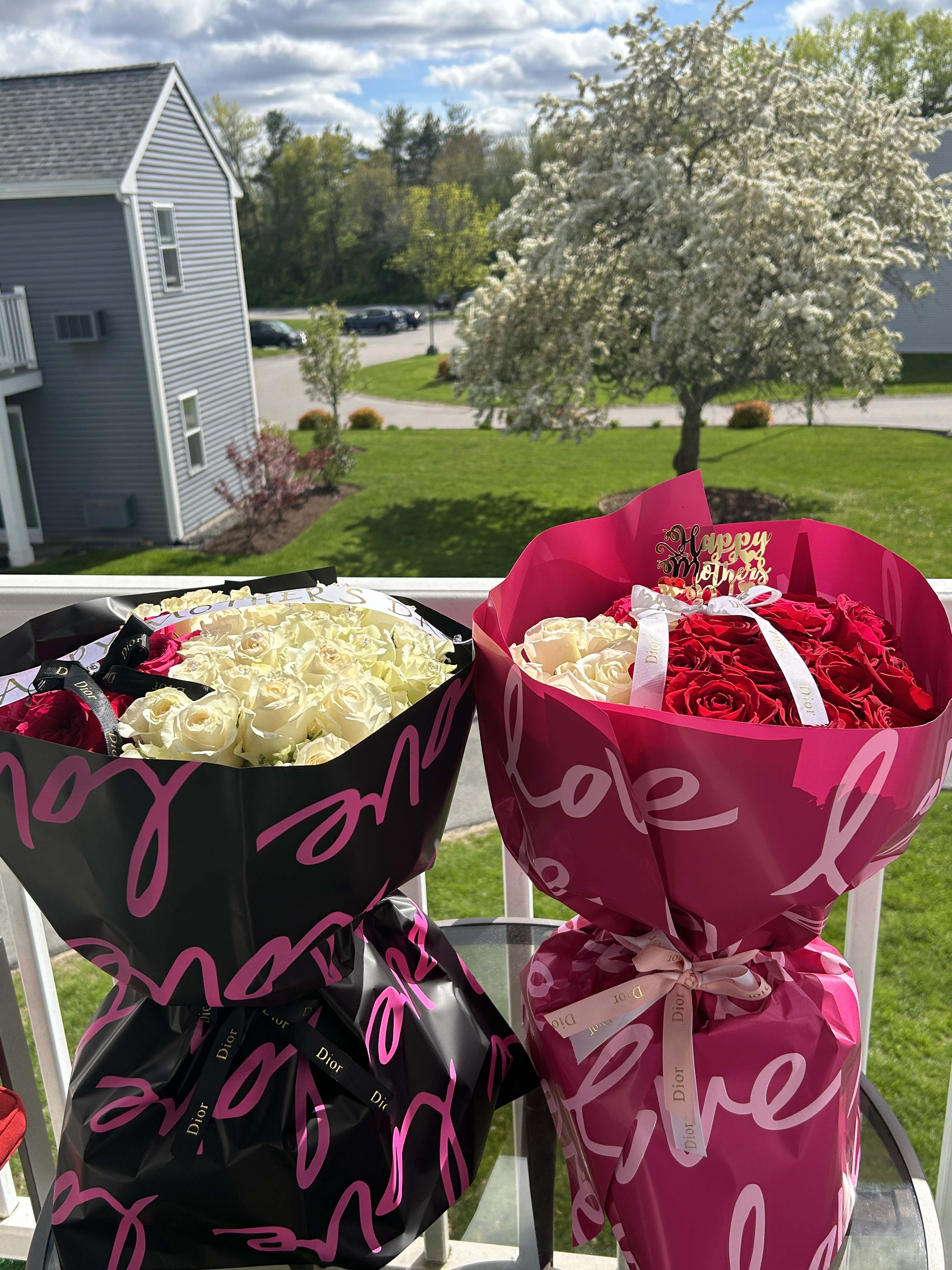 mixed roses wrapped in luxurious wrapping paper  - These colorful blooms symbolize happiness, enthusiasm and energy making them a perfect choice to brighten someones day or bring a pop of color to any space 