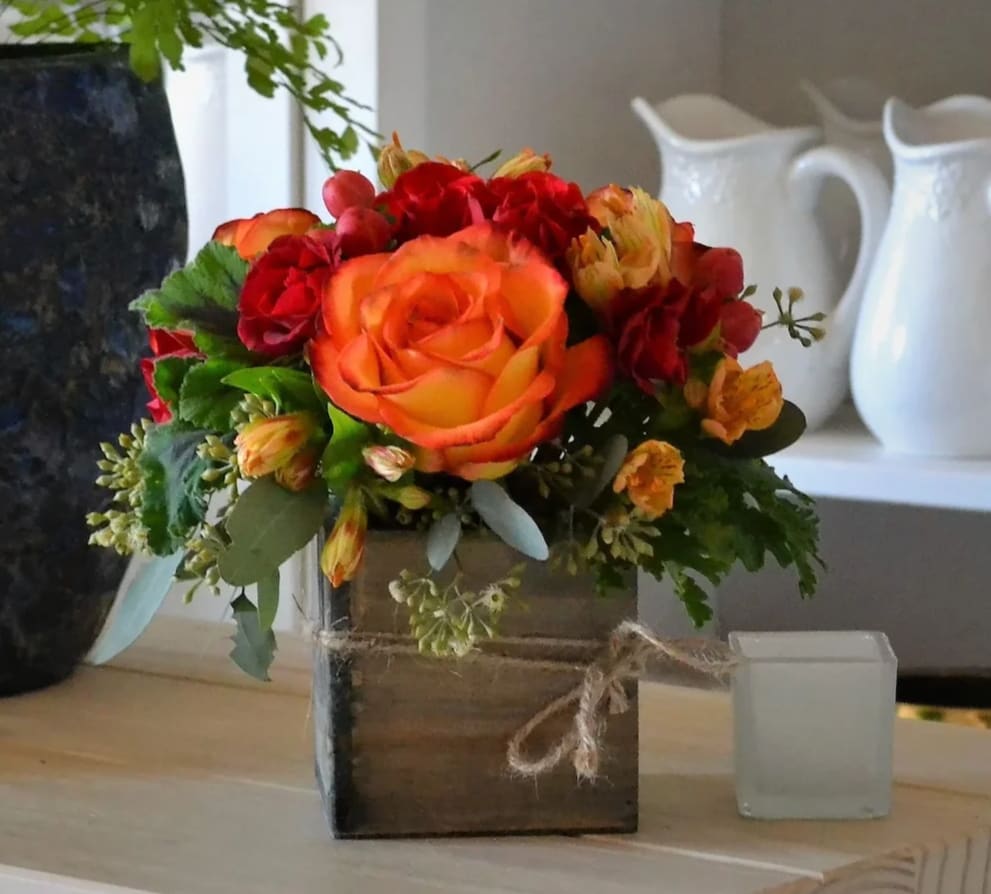 Ginger - FB - Introducing Ginger, the delightful petite bouquet that proves good things really do come in small packages! Crafted with love and care, Ginger is designed to bring a touch of rustic charm to your space, while showcasing the beauty of Orange Roses, Red spray roses, and lush greens.  Flower Delivery:- We offer Same Day | Free Local Delivery in the Sunland, Tujunga, and Neighboring cities In Los Angeles, Ca . Ask for Details   