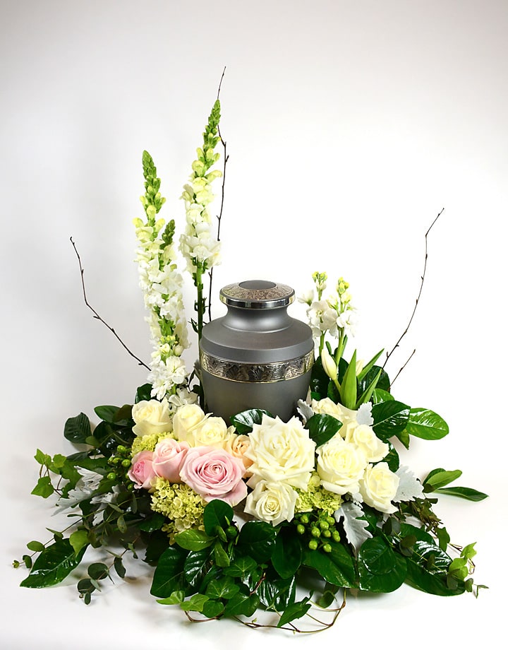 Serenity Serenity - Elegant white and cream flowers surrounding loved ones creates a beautiful peaceful setting.