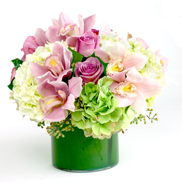 Pretty Princess Pretty Princess - My Sherman Oaks Florist presents an arrangement that has a mix of Pink and Green Flowers for the Desk in an Approx.8" round glass vase. This pretty piece is vision in any room it is placed in. A beautiful blend of Orchids, Hydrangeas, and seasonal greens allowing it to brighten up the room it is in.