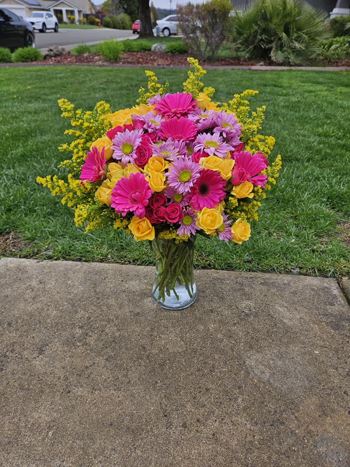 Katey's Sunny Day - Gerbera Daisies, spray roses, and solidago.