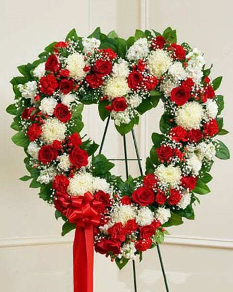 open heart with love - This standing open heart designed features a beautiful red and white mix such as roses, mums, mini carnations and more 18in shown 21in is deluxe ) 24in premium