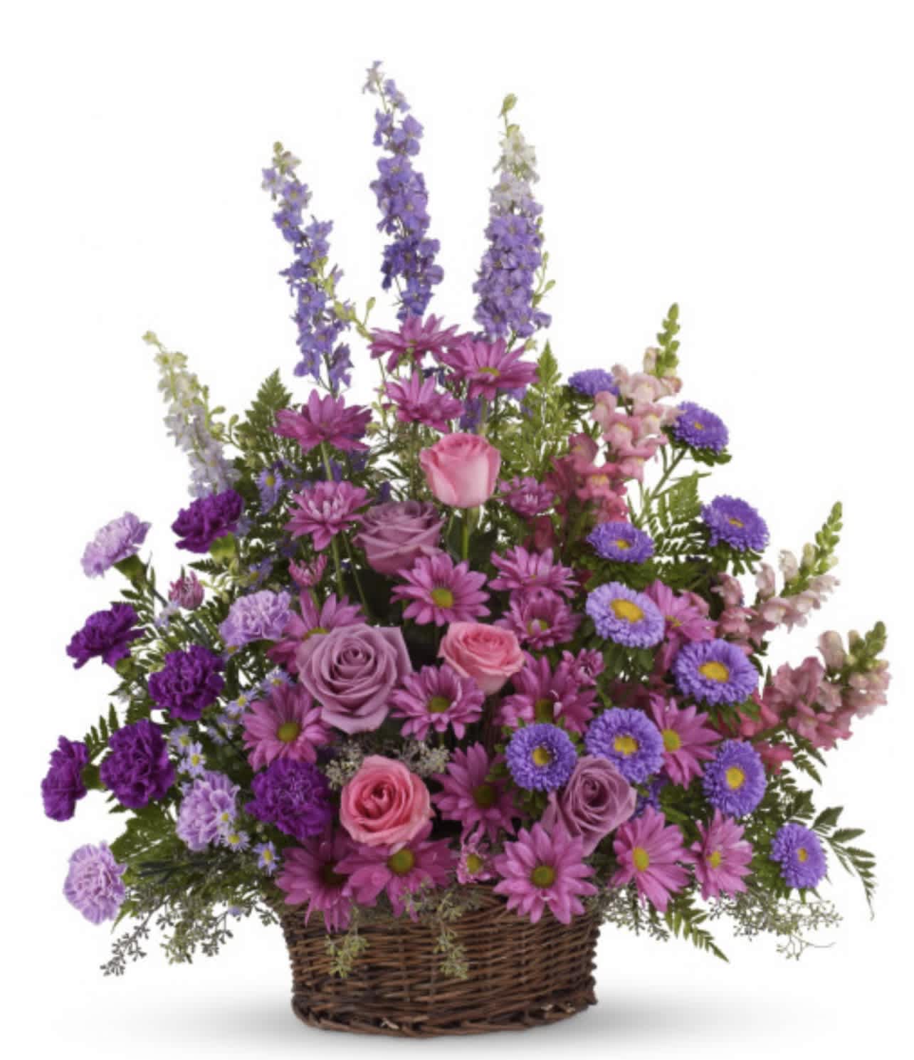 Gracious Lavender Basket Gracious Lavender Basket - Soothing lavender, respectful purple and compassionate pinks are combined beautifully in this basket overflowing with pretty flowers, sincerity and sympathy. A lovely way to share your thoughts and pay tribute to someone special.